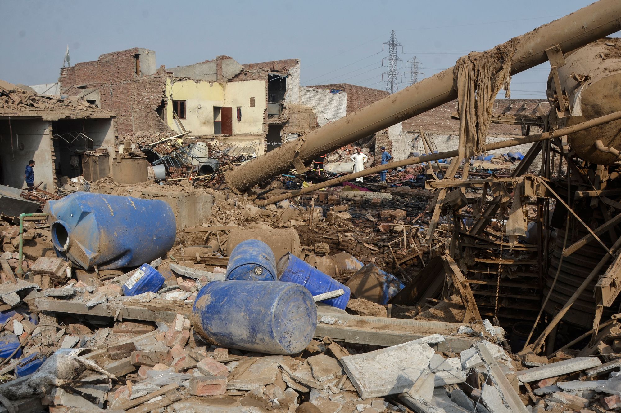 Rescuers search for survivors after an explosion at a chemical factory in Faisalabad, Pakistan, on 21 November 2025