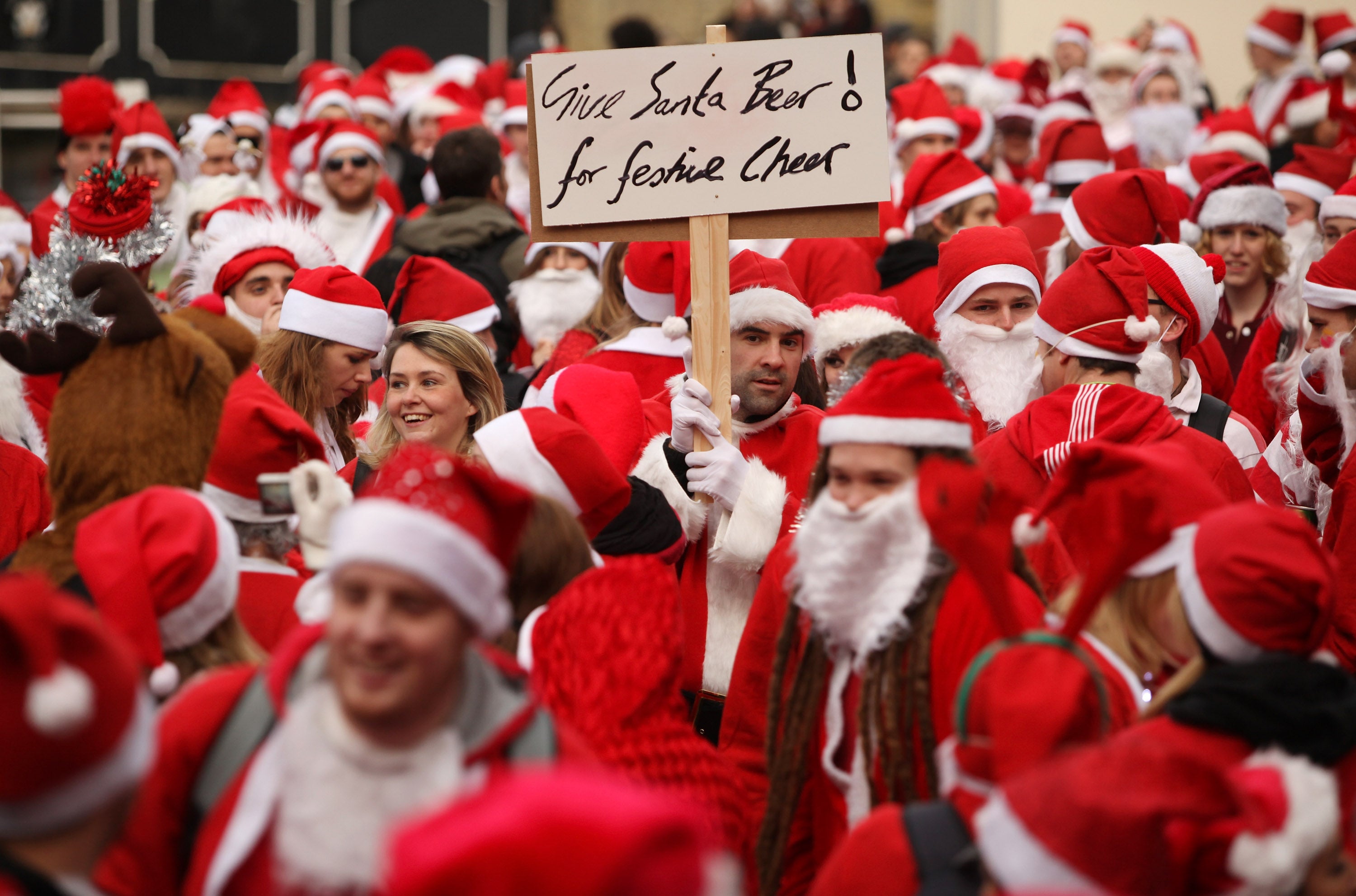 SantaCon was originally conceived as performance art but has become a 'reviled bar crawl'