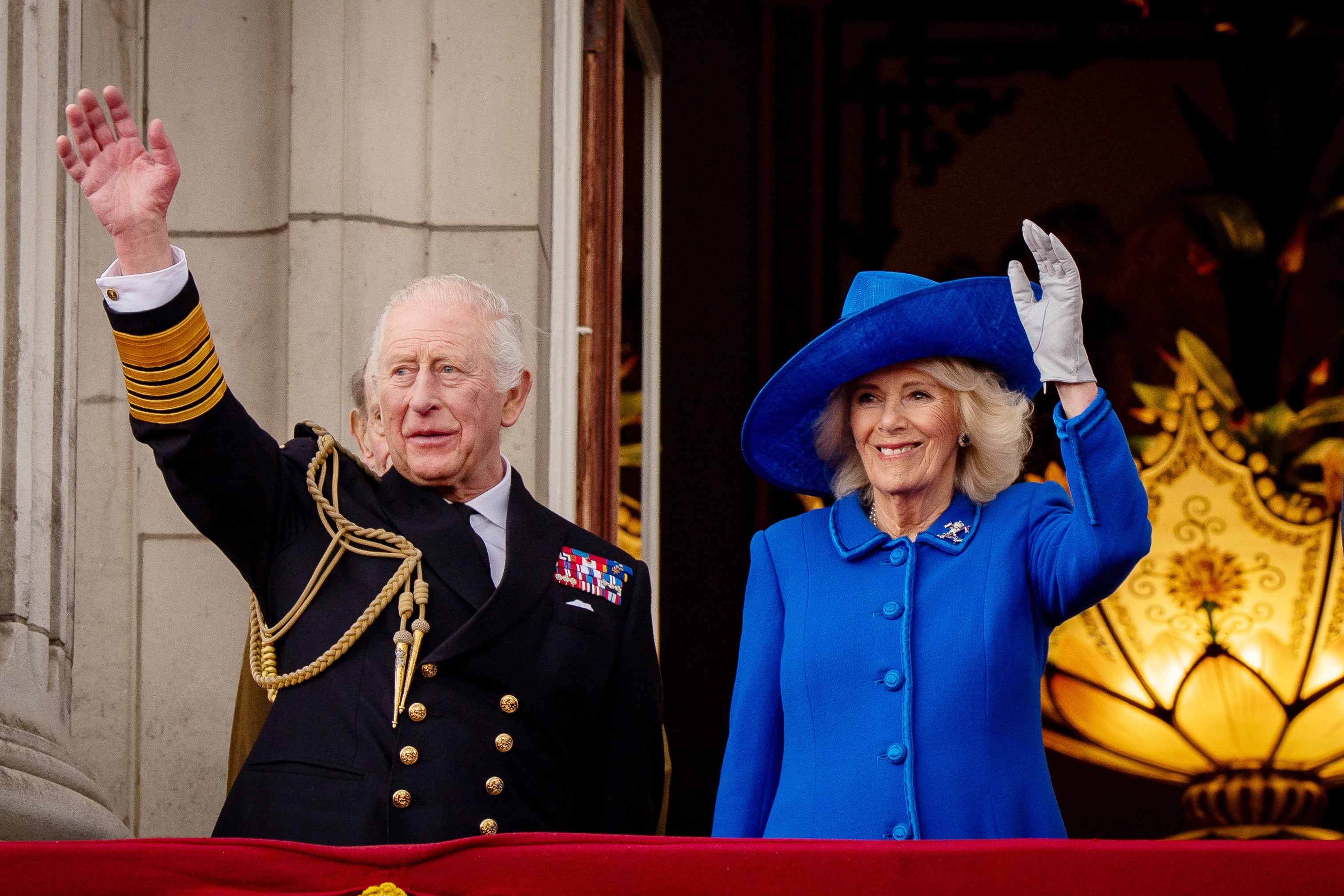 King Charles III and Queen Camilla on the balcony of Buckingham Palace, marking the 80th anniversary of VE Day