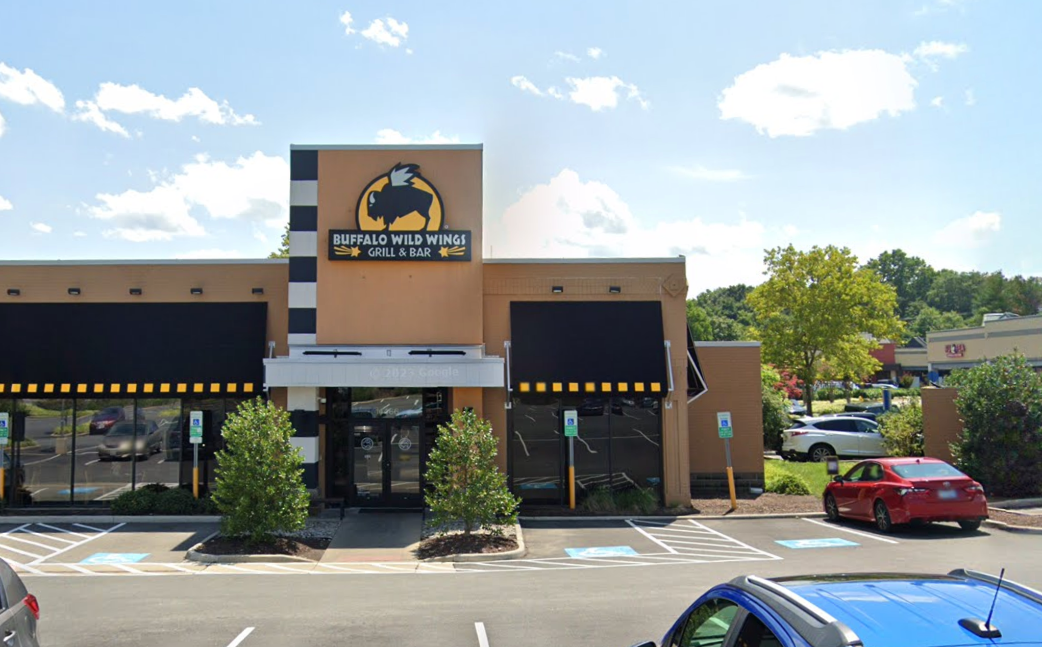 Marc and Natasha Loman went out for a late-night bite at Buffalo Wild Wings store no. 280 in Woodbridge, Virginia, seen here, where they say they discovered a shocking racial epithet printed on their receipt.