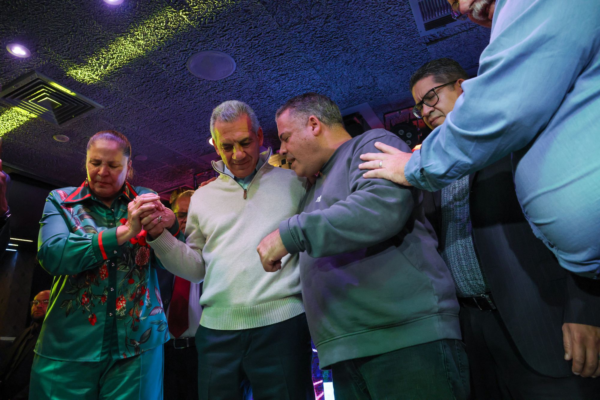 Jack Ciattarelli, prays with faith leaders while speaking to supporters at a restaurant popular with the Latino community on October 23, 2025 in Paterson, New Jersey. But Ciattarelli failed to hold the gains Trump made with Hispanics in New Jersey.