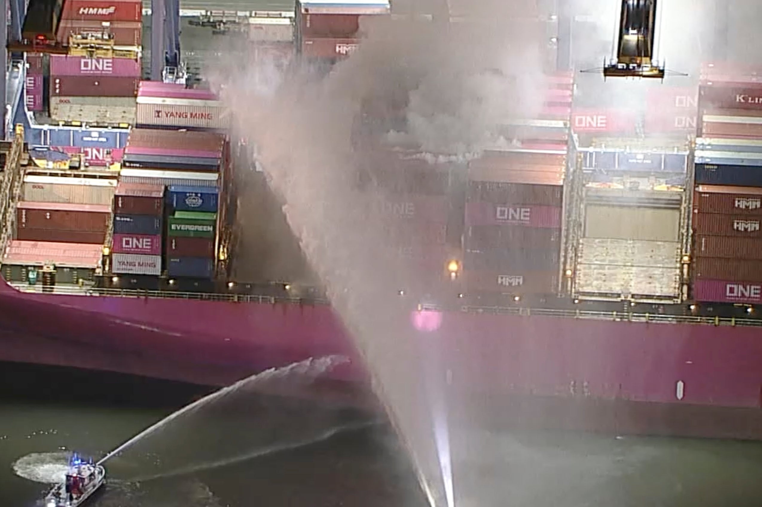First responders battling a blaze on a container ship docked at the Port of Los Angeles, Friday, 21 November 2025, in Los Angeles