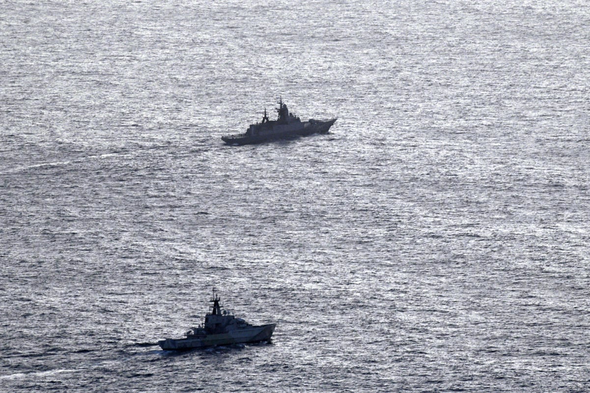 In this undated aerial photo released by the United Kingdom Ministry of Defence, HMS Severn, lower section, is seen tracking the Russian corvette RFN Stoikiy off the UK coast. (United Kingdom Ministry of Defence via AP)