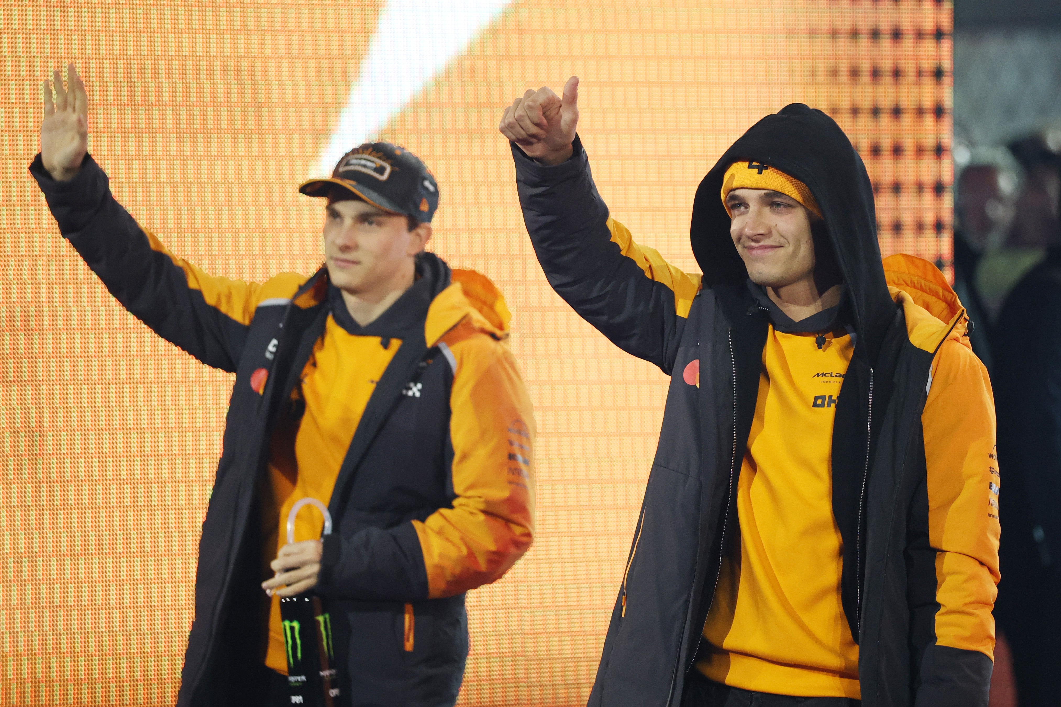 Oscar Piastri of Australia and McLaren and Lando Norris of Great Britain and McLaren wave on the drivers parade prior to the F1 Grand Prix of Las Vegas at Las Vegas Strip Circuit on November 22, 2025 in Las Vegas, Nevada. (Photo by Chris Graythen/Getty Images)