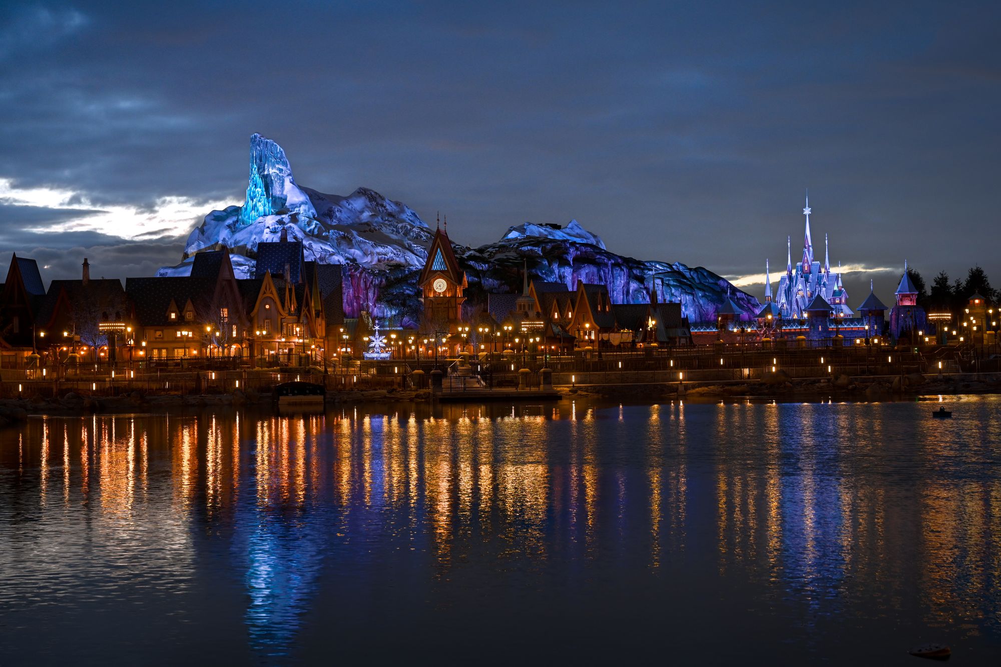 This shows Arendelle village, twinkling beneath North Mountain and Elsa’s Ice Palace