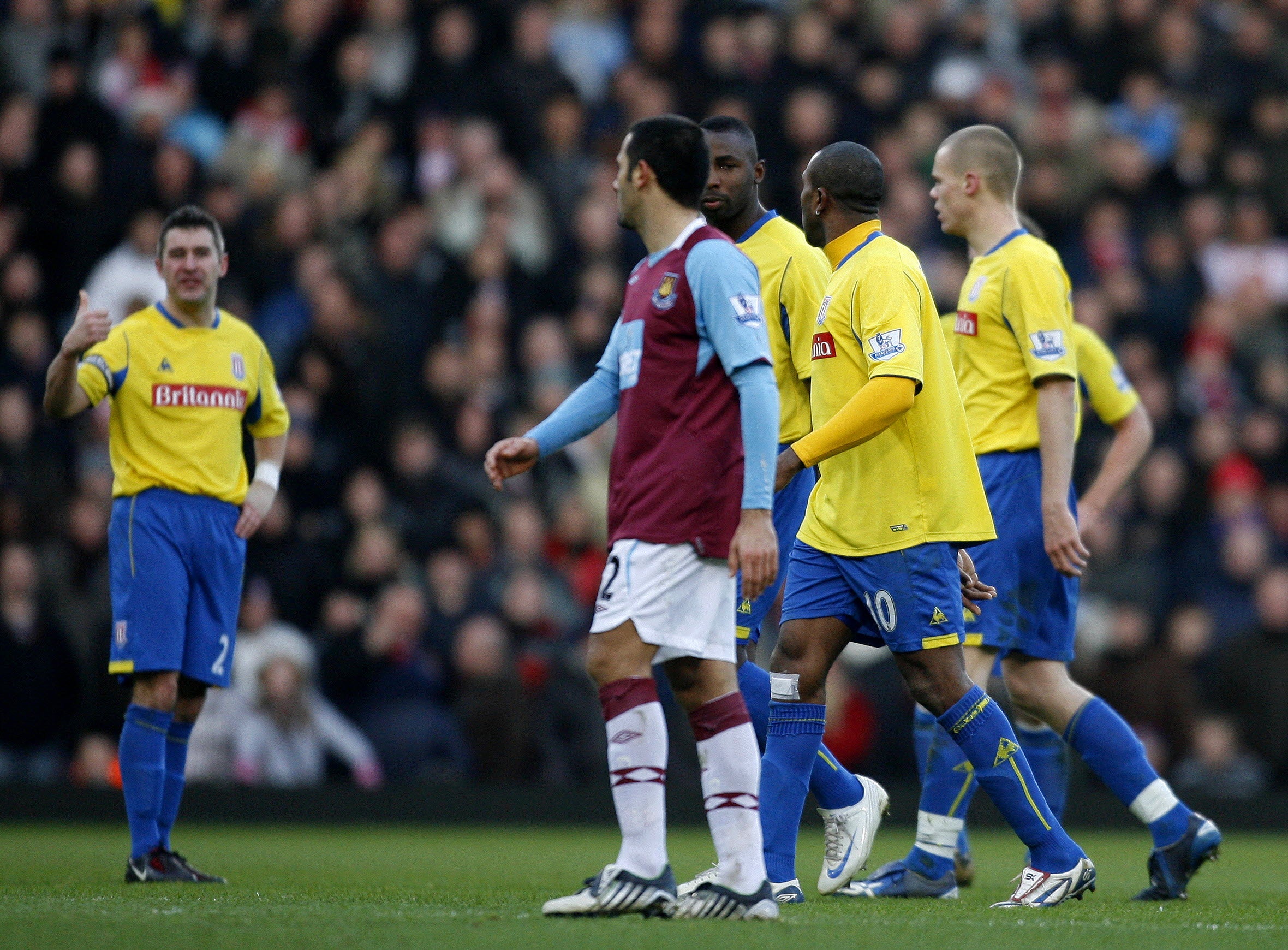 Fuller (middle) was sent off for slapping Griffin (left) in a 2-1 defeat at West Ham in December 2008
