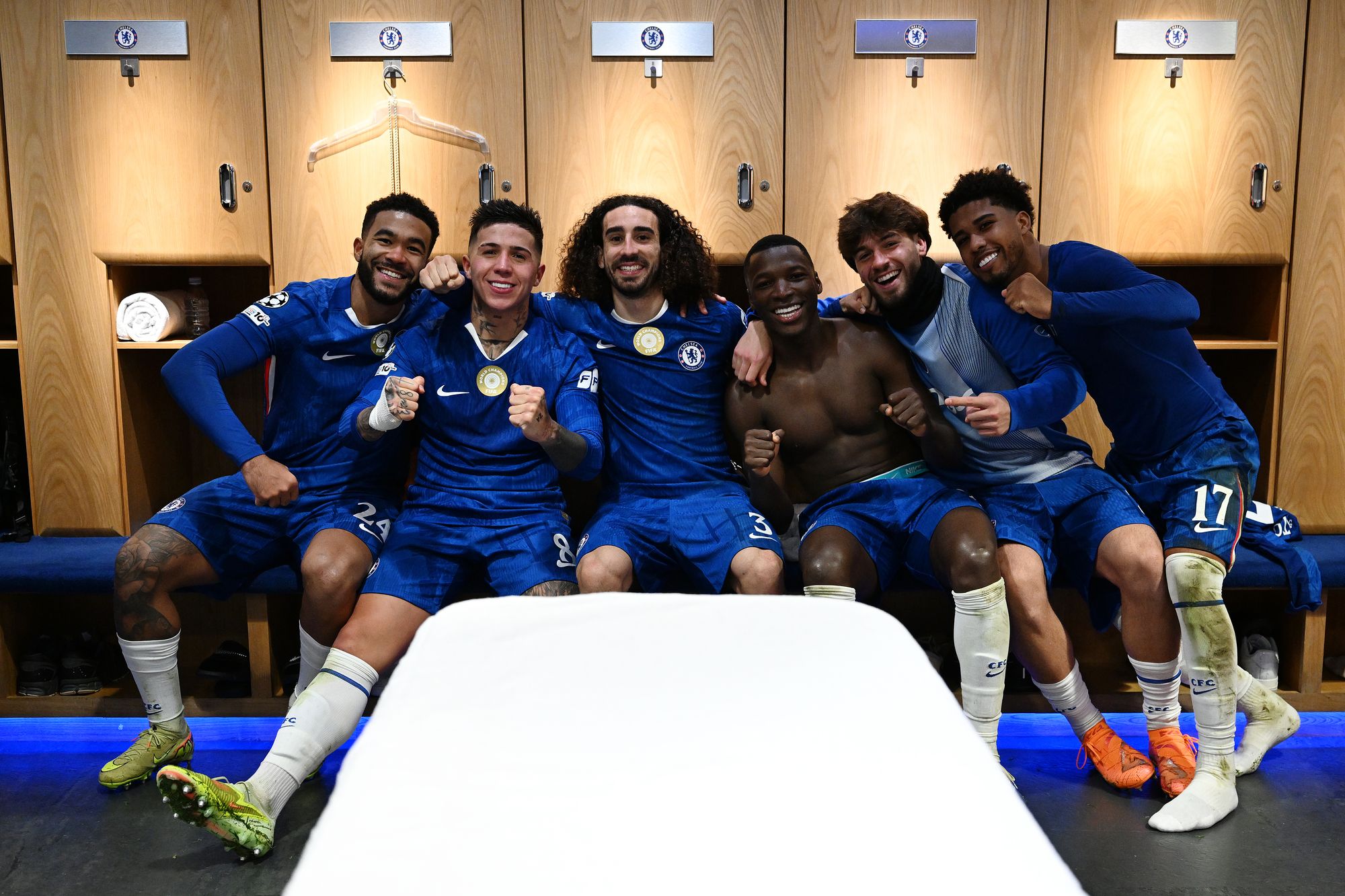 <p>Chelsea players celebrate victory in the dressing room</p>