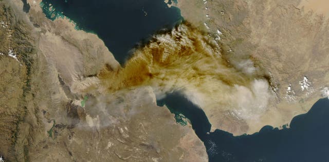 <p>Ash rising from the eruption of the Hayli Gubbi volcano in Ethiopia as it drifts over the Red Sea</p>