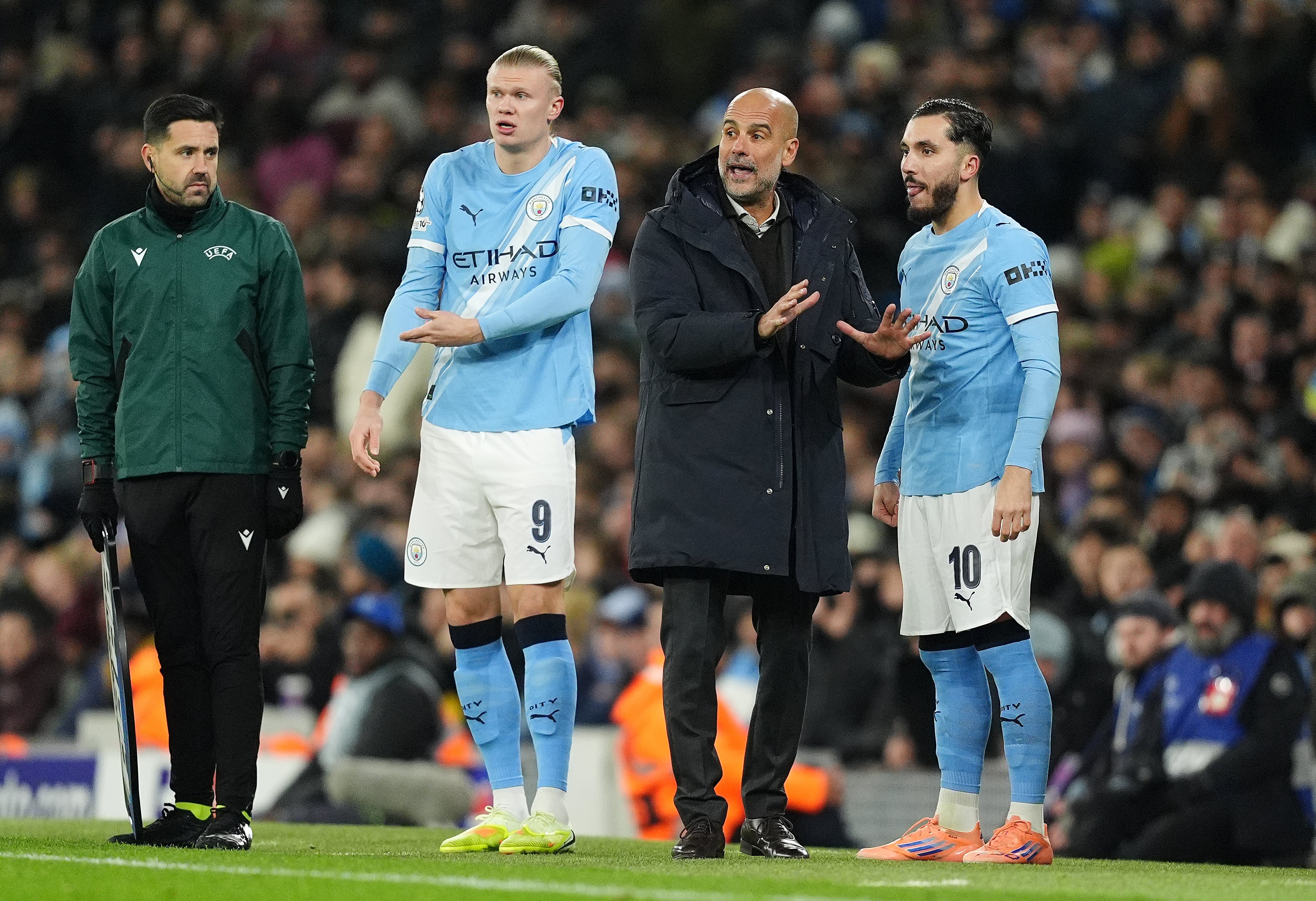Pep Guardiola had to bring on Erling Haaland (centre left) and Rayan Cherki (right) in an unsuccessful attempt to avoid defeat