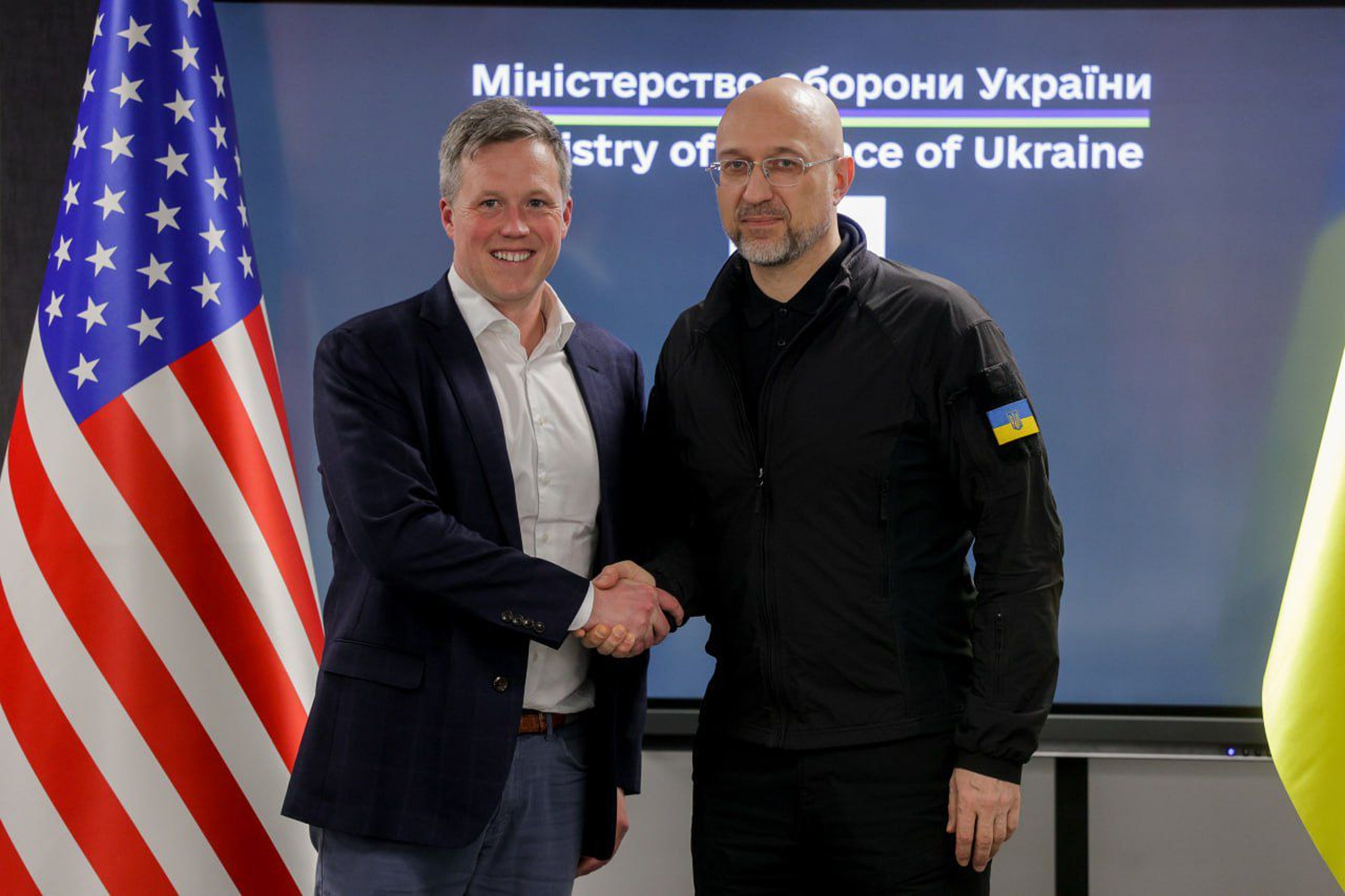 Ukrainian Defense Minister Denys Shmyhal, right, shakes hands with US Secretary of the Army Dan Driscoll in Kyiv, Ukraine