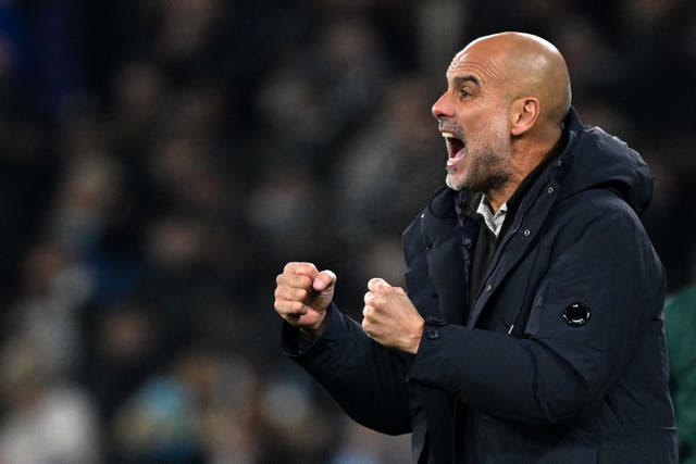 <p>Pep Guardiola cuts a frustrated figure on the touchline as City are beaten by Leverkusen</p>
