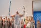 Winter Olympics torch lighting ceremony moved to museum amid bad weather
