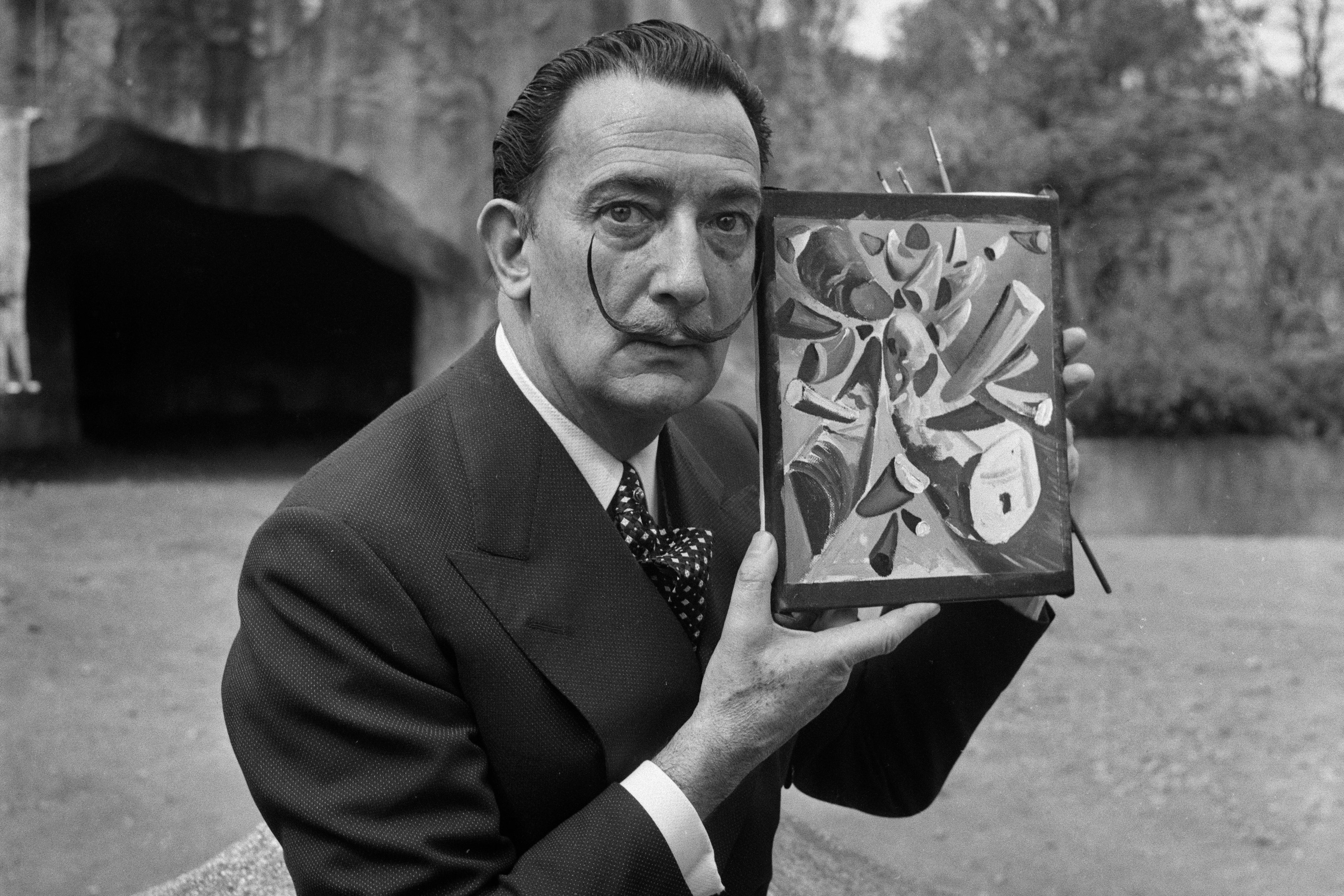 The art appraiser is accused of selling fake works by greats such as surrealist artist Salvador Dali, shown above