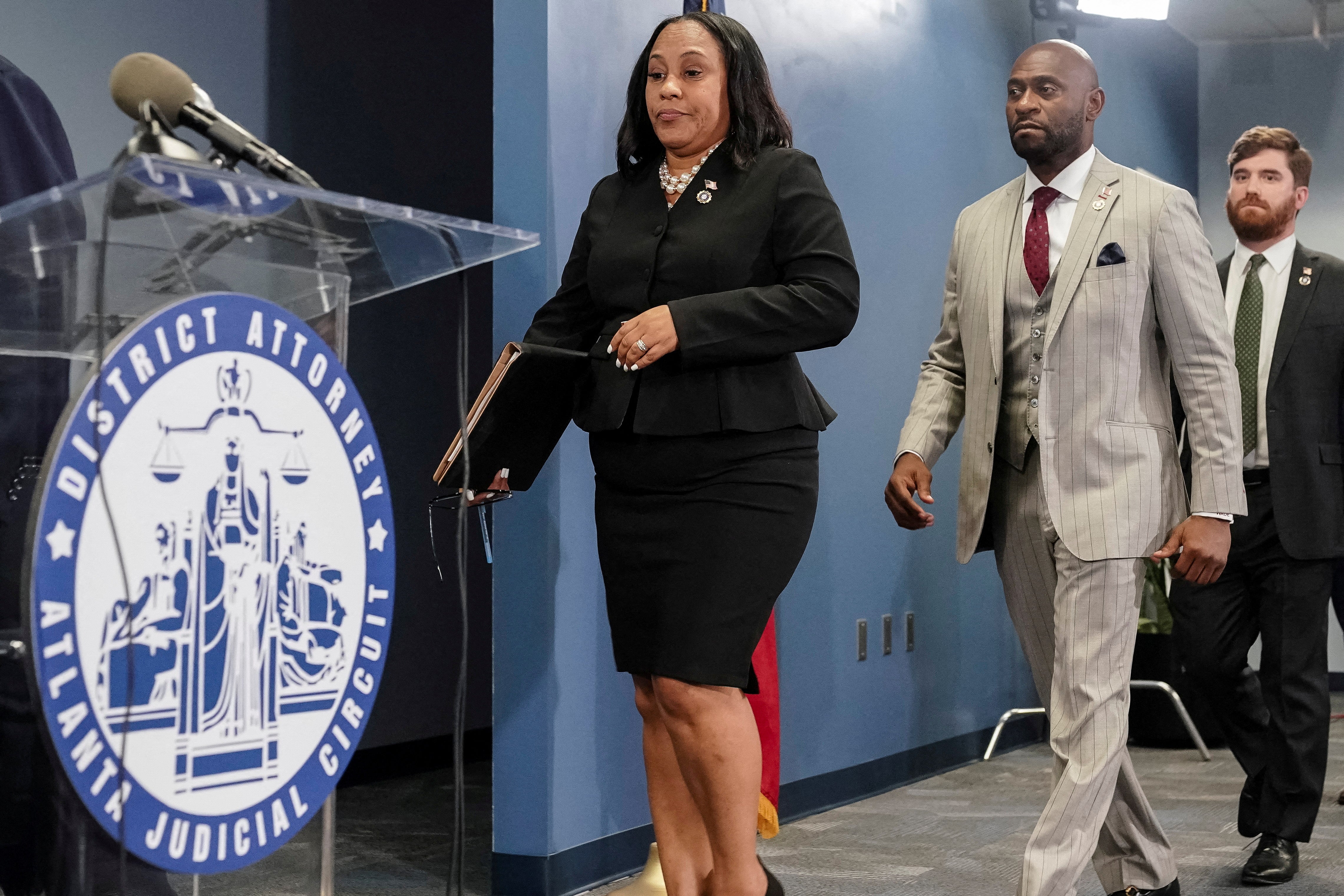 Fulton County district attorney Fani Willis was removed from her long-running case against the president and his allies, and a newly appointed prosecutor to lead the case argued to drop it altogether November 26