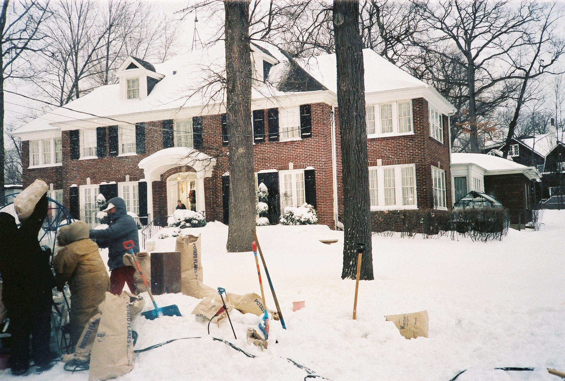 The 'Home Alone' crew using potato flakes to simulate snow outside the Winnetka home