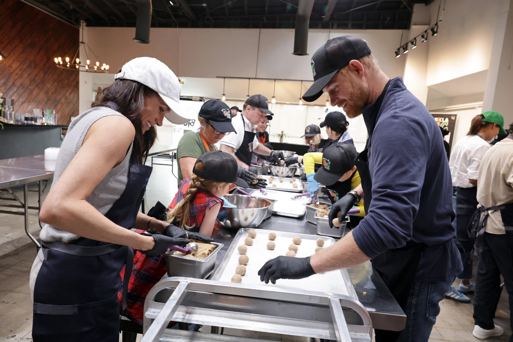 Prince Harry and Meghan, Duke and Duchess of Sussex, alongside the Archewell team, joined Our Big Kitchen Los Angeles (OBKLA) to prepare and package meals for community members experiencing food insecurity