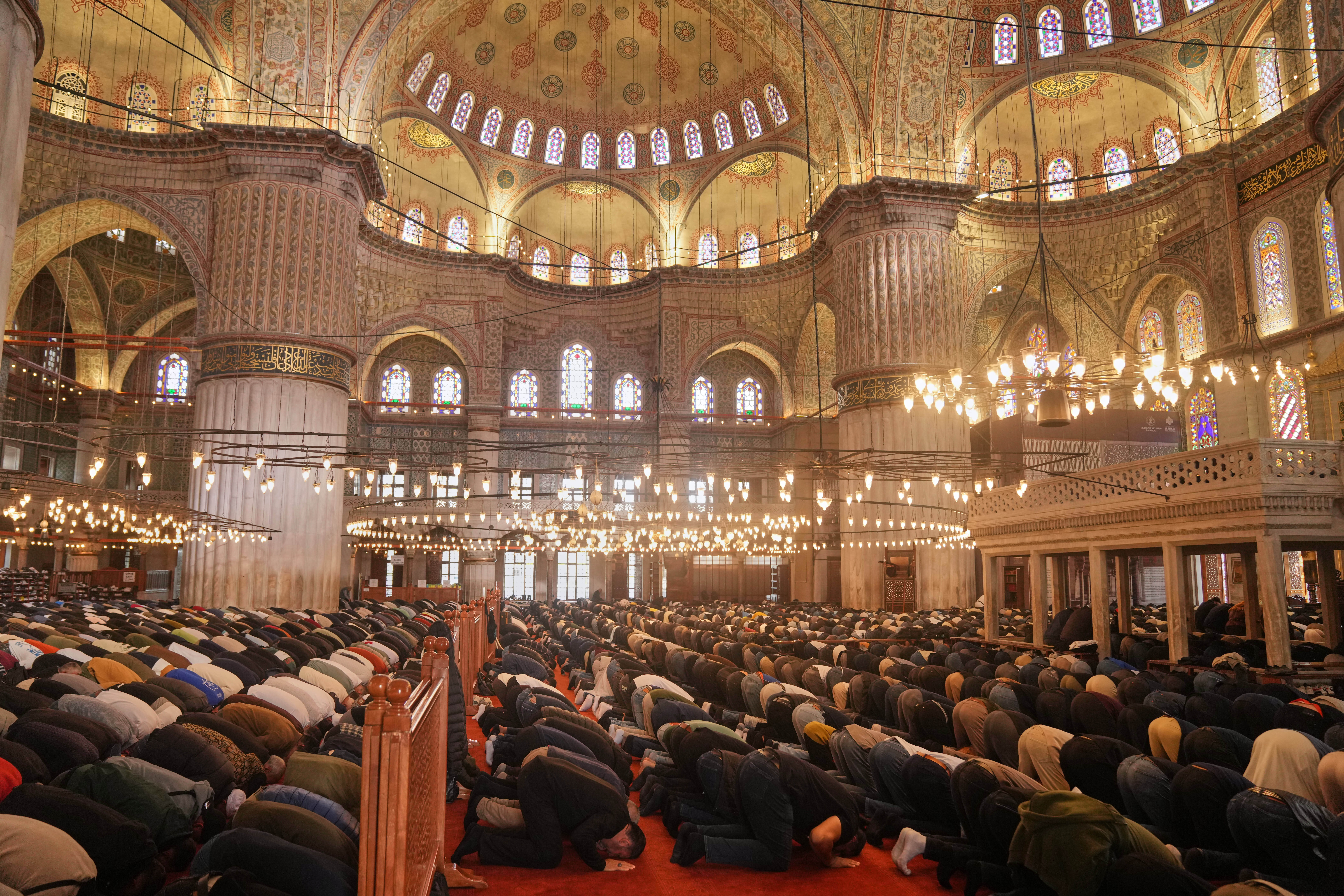 Muslims pray at the Ottoman-era Sultan Ahmed or Blue Mosque, in Istanbul ahead of the visit of Pope Leo XIV to Turkey