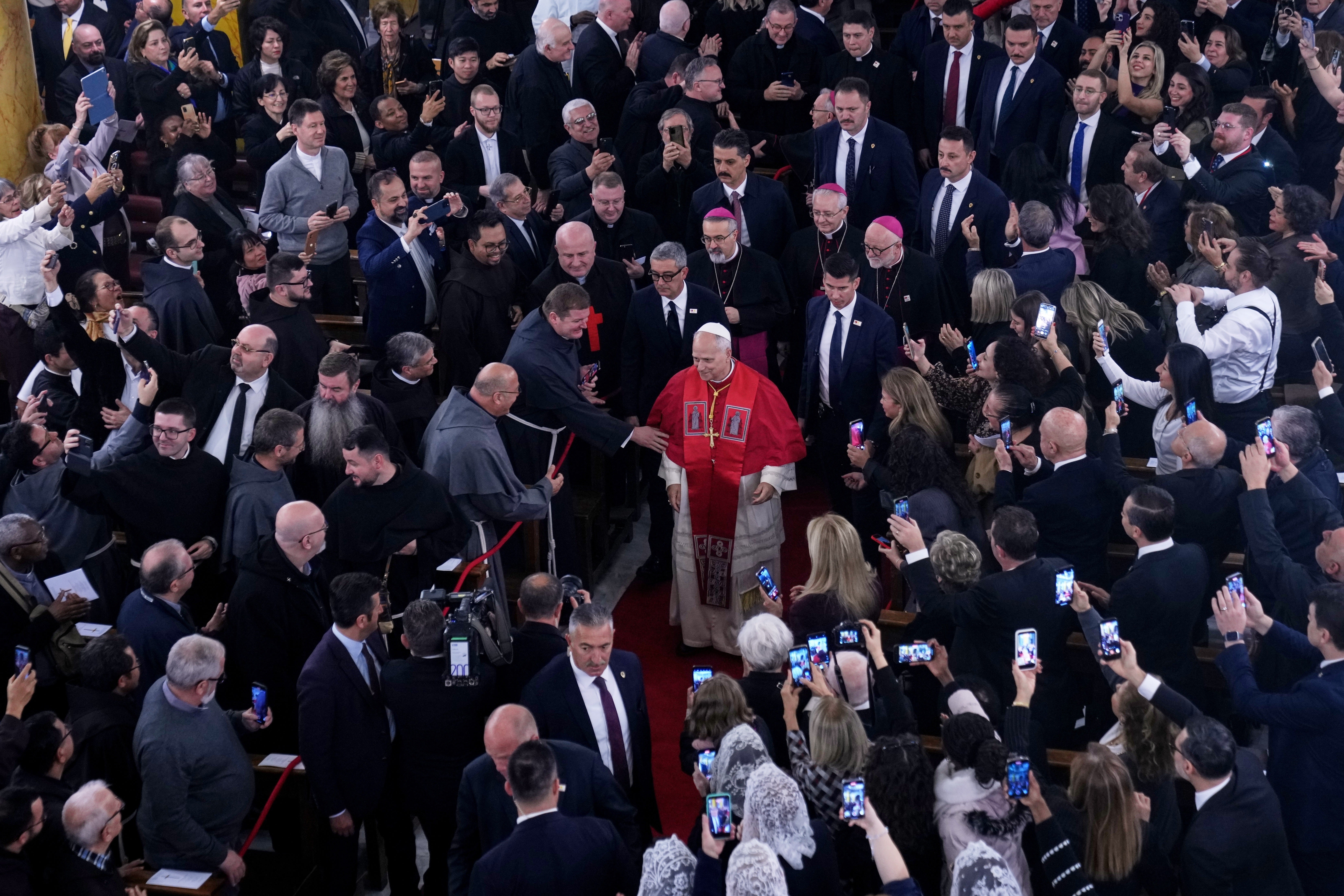 Pope Leo XIV arrives for a meeting with the clergy at the Cathedral of the Holy Spirit, in Istanbul