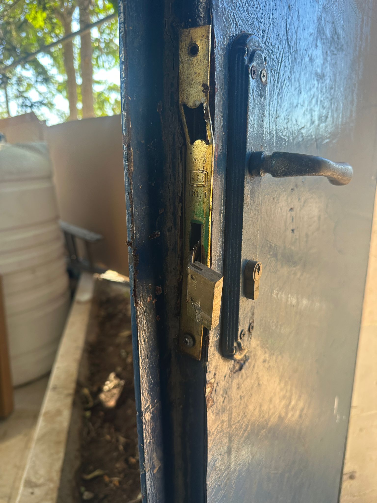 Pictures show damage to the lock on Amro’s door