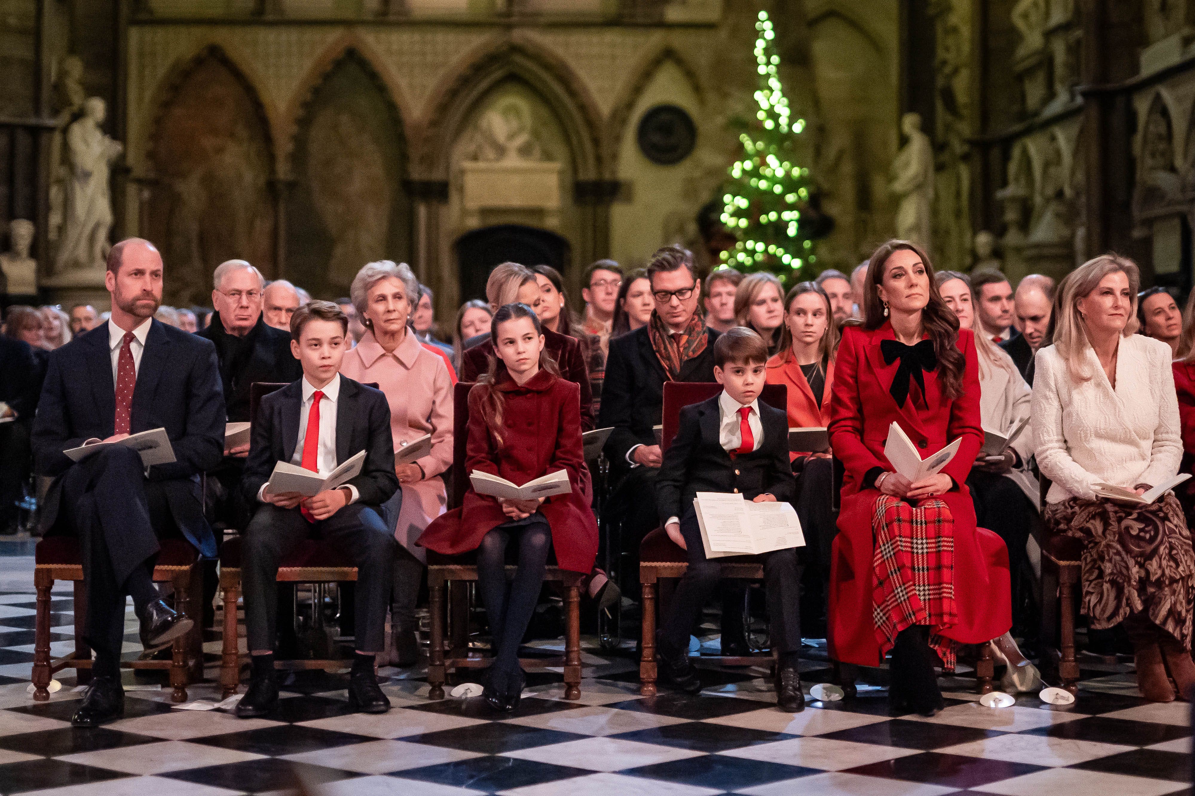 The Prince of Wales, Prince George, Princess Charlotte, Prince Louis, Princess of Wales and the Duchess of Edinburgh during last year’s Together At Christmas carol service
