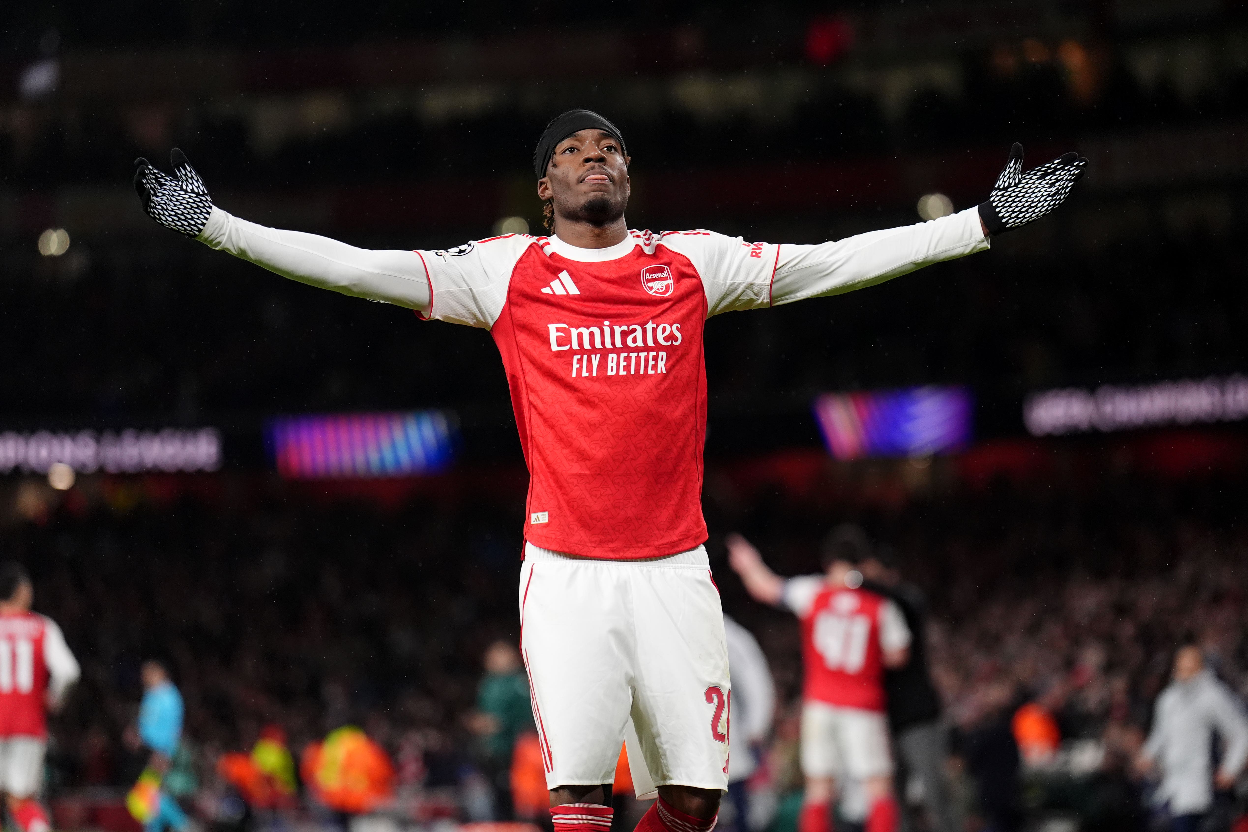Noni Madueke celebrates scoring his first goal for Arsenal against Bayern Munich (John Walton/PA)