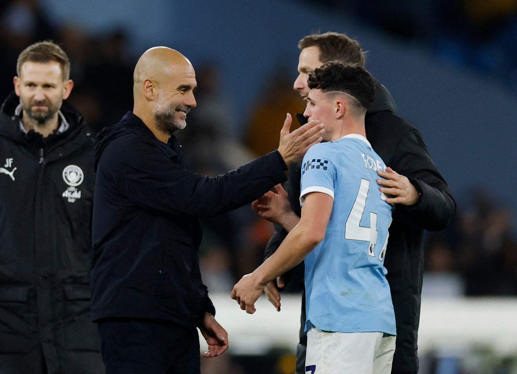 Foden is congratulated by manager Pep Guardiola