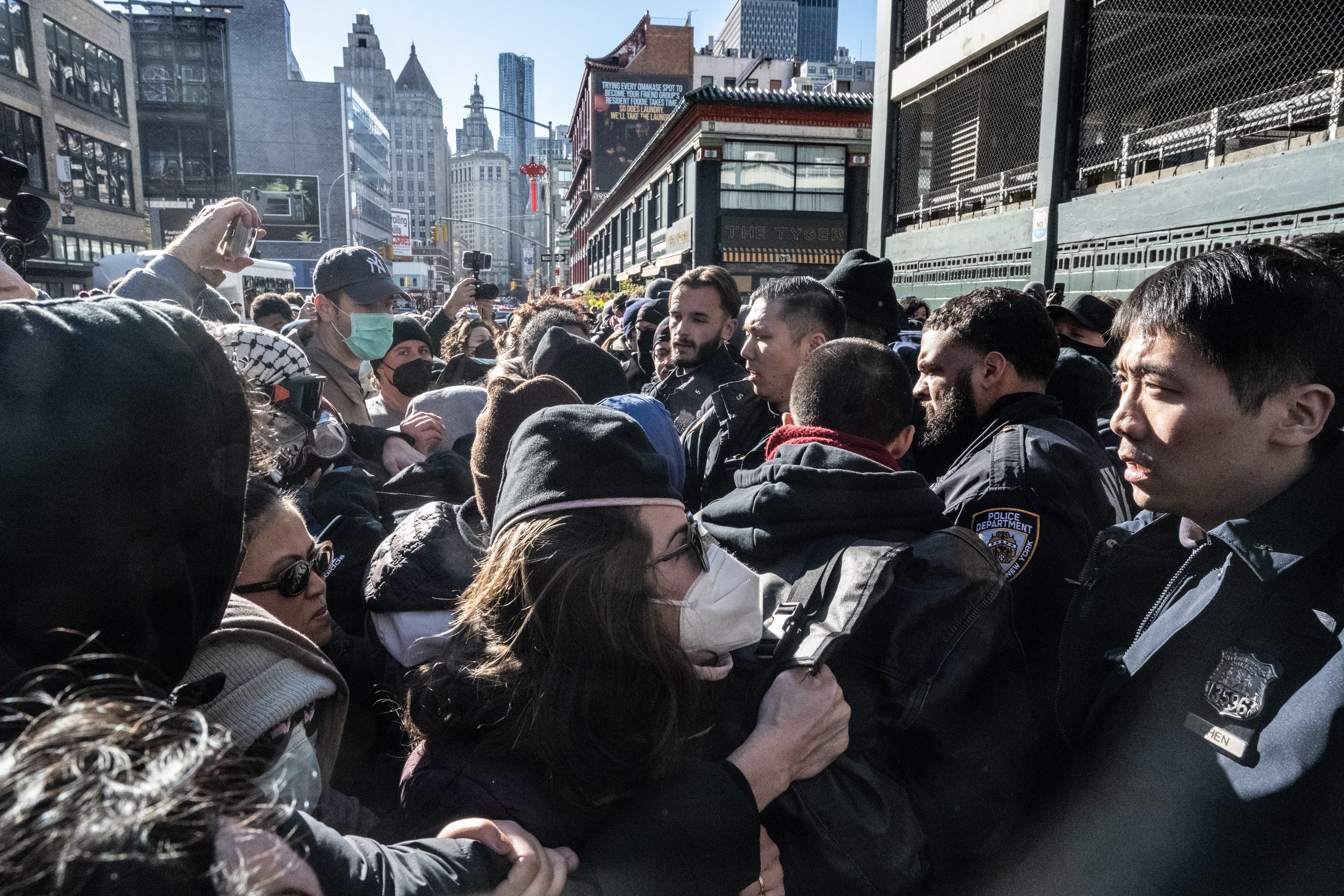 Protesters appeared to foil a federal immigration raid in downtown Manhattan by forming a barricade of bodies, preventing federal agents from exiting a parking garage