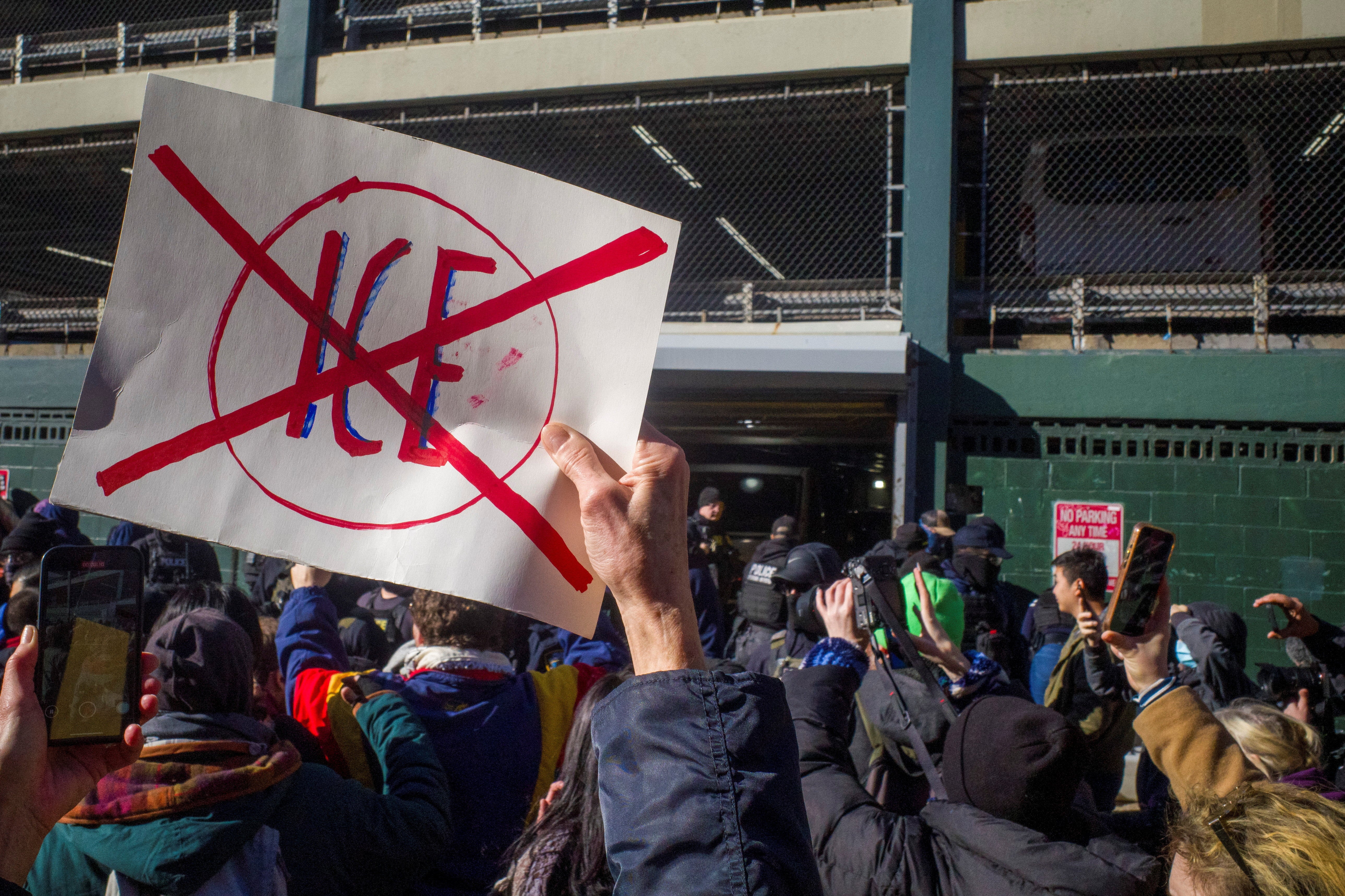 Protesters shouted “ICE out of New York!” as they blocked the entrance of the parking garage on the edge of Chinatown, just blocks away from a raid last month