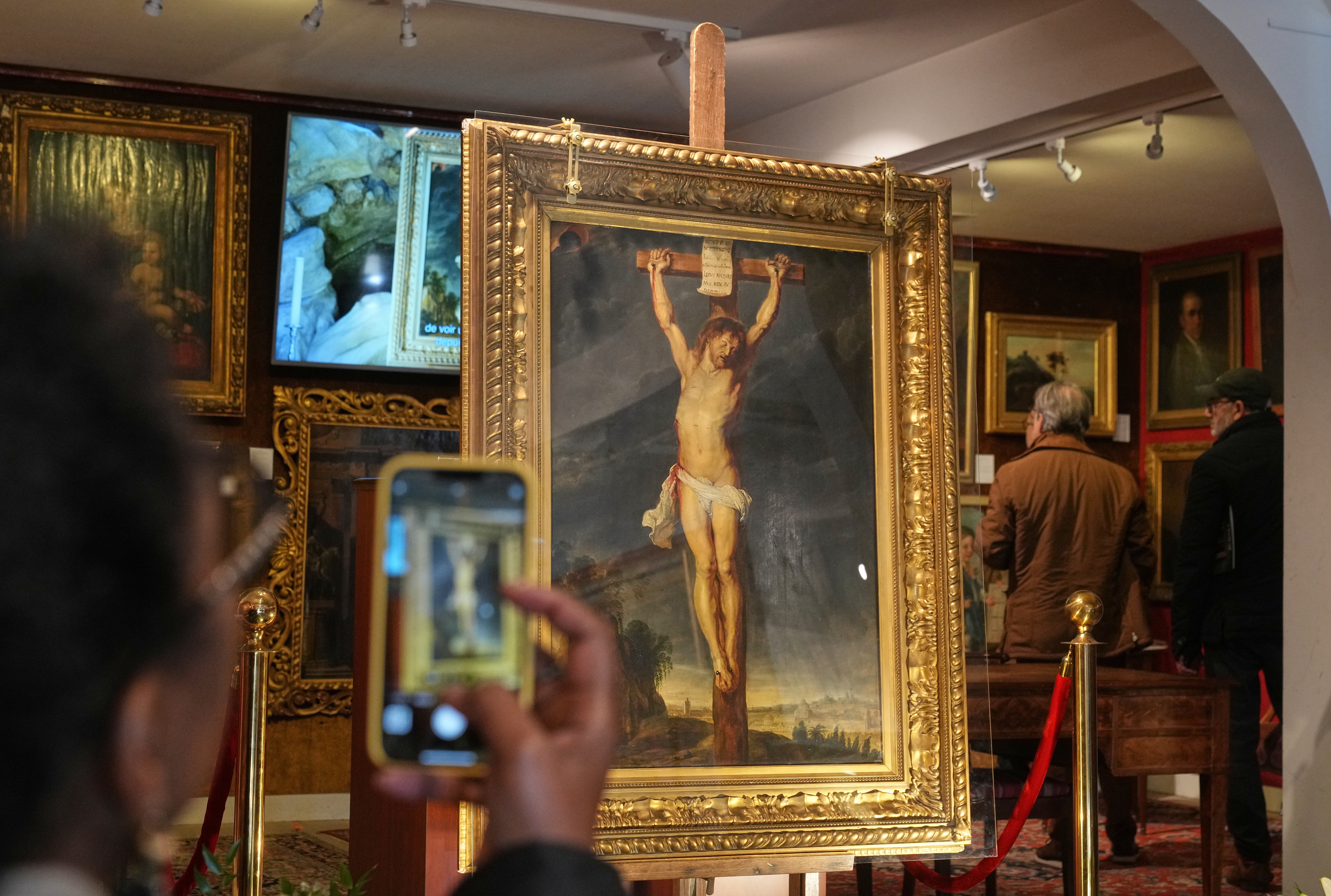 Long-lost painting - the Crucifixion of Jesus Christ - by Baroque master Peter Paul Ruben is displayed at the auction house Osenat in Versailles