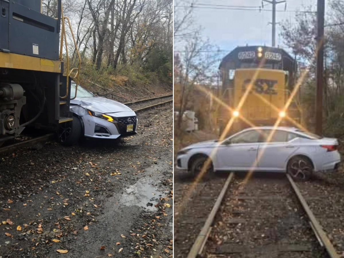 A woman miraculously only suffered minor injuries after a freight train slammed into her car in New Jersey