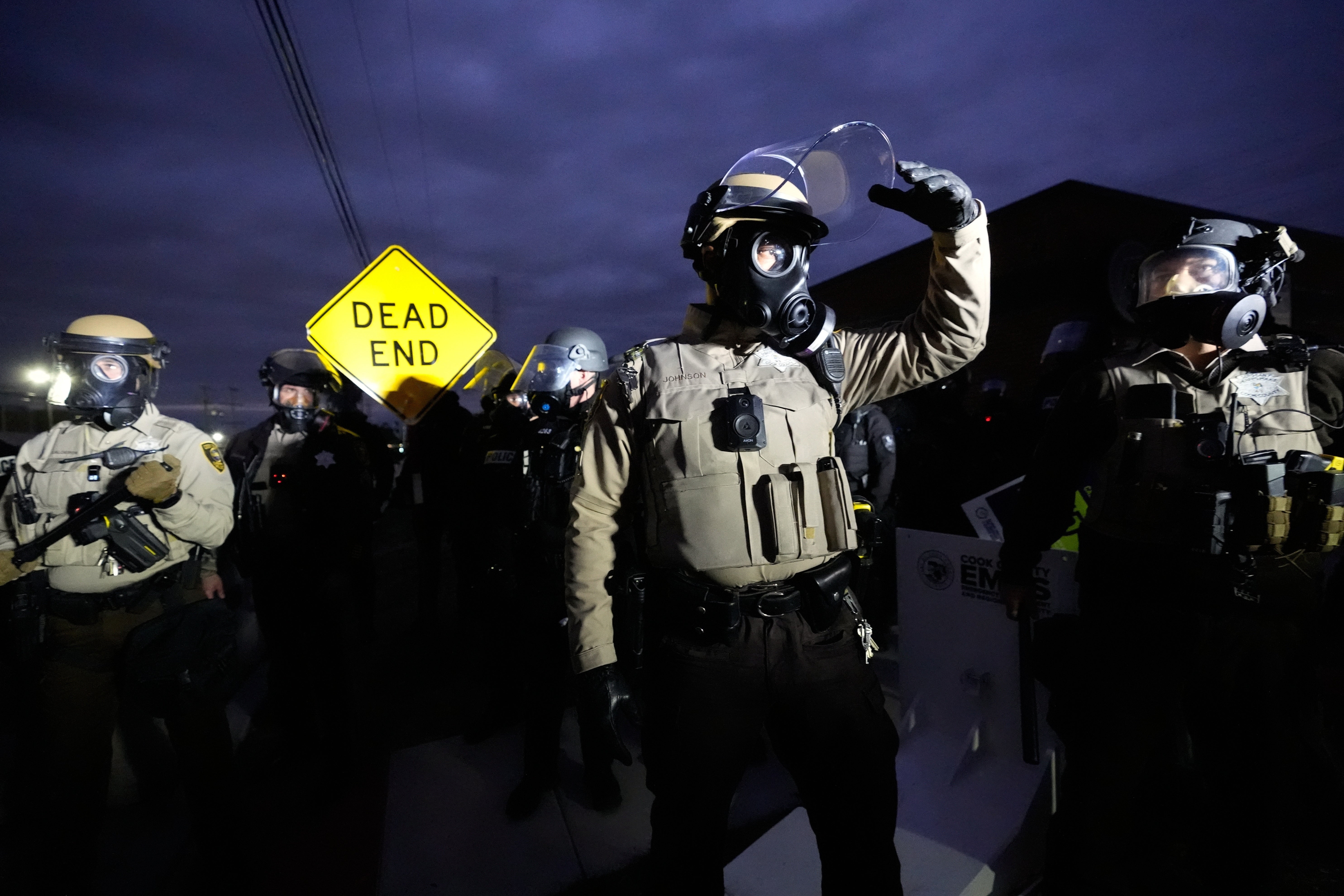 ICE agents fired tear-gas at protestors while searching for someone