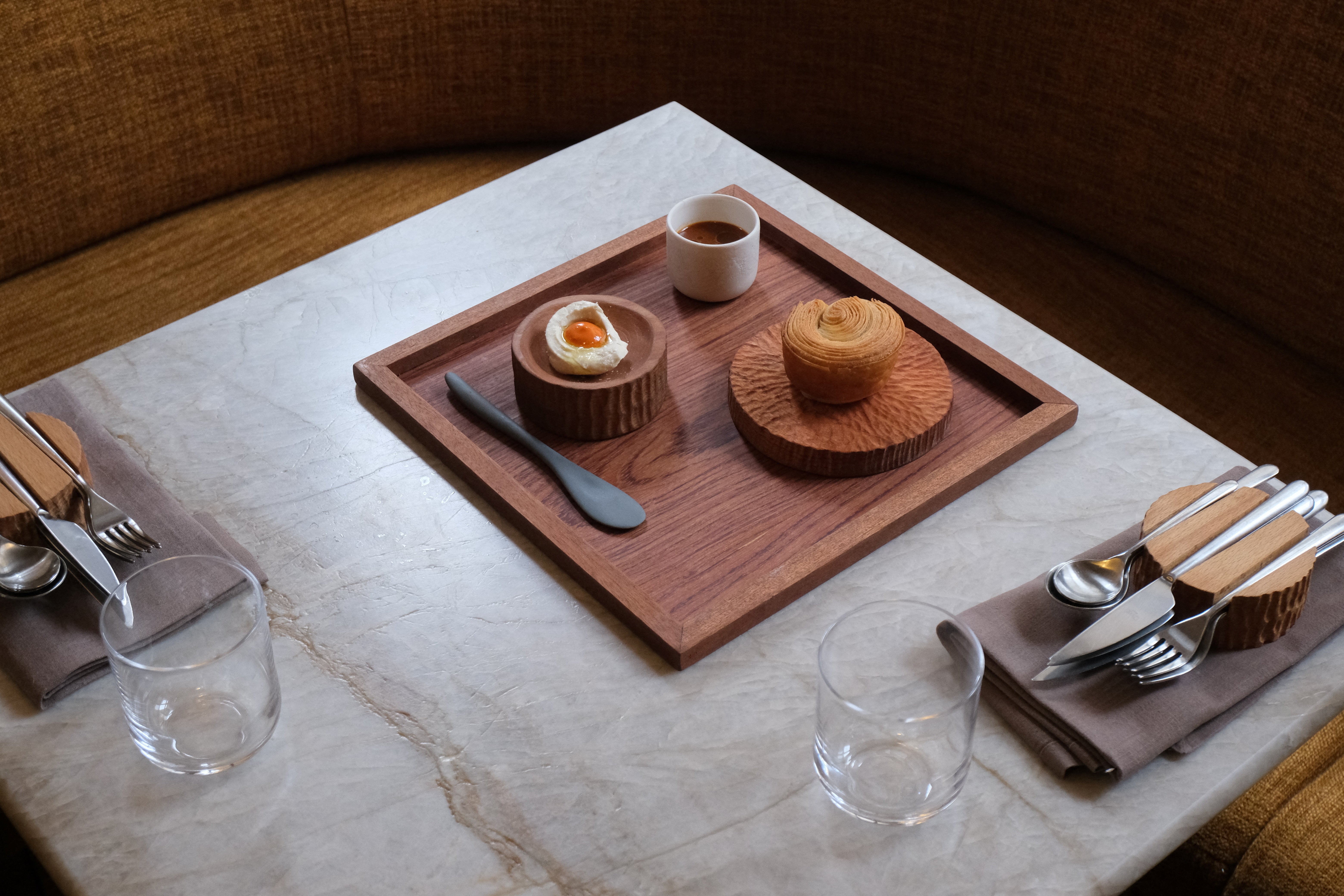 Cornish potatoes, toasted hazelnut, sweet & sour apricot, a vegan dish on the menu at Plates restaurant in London