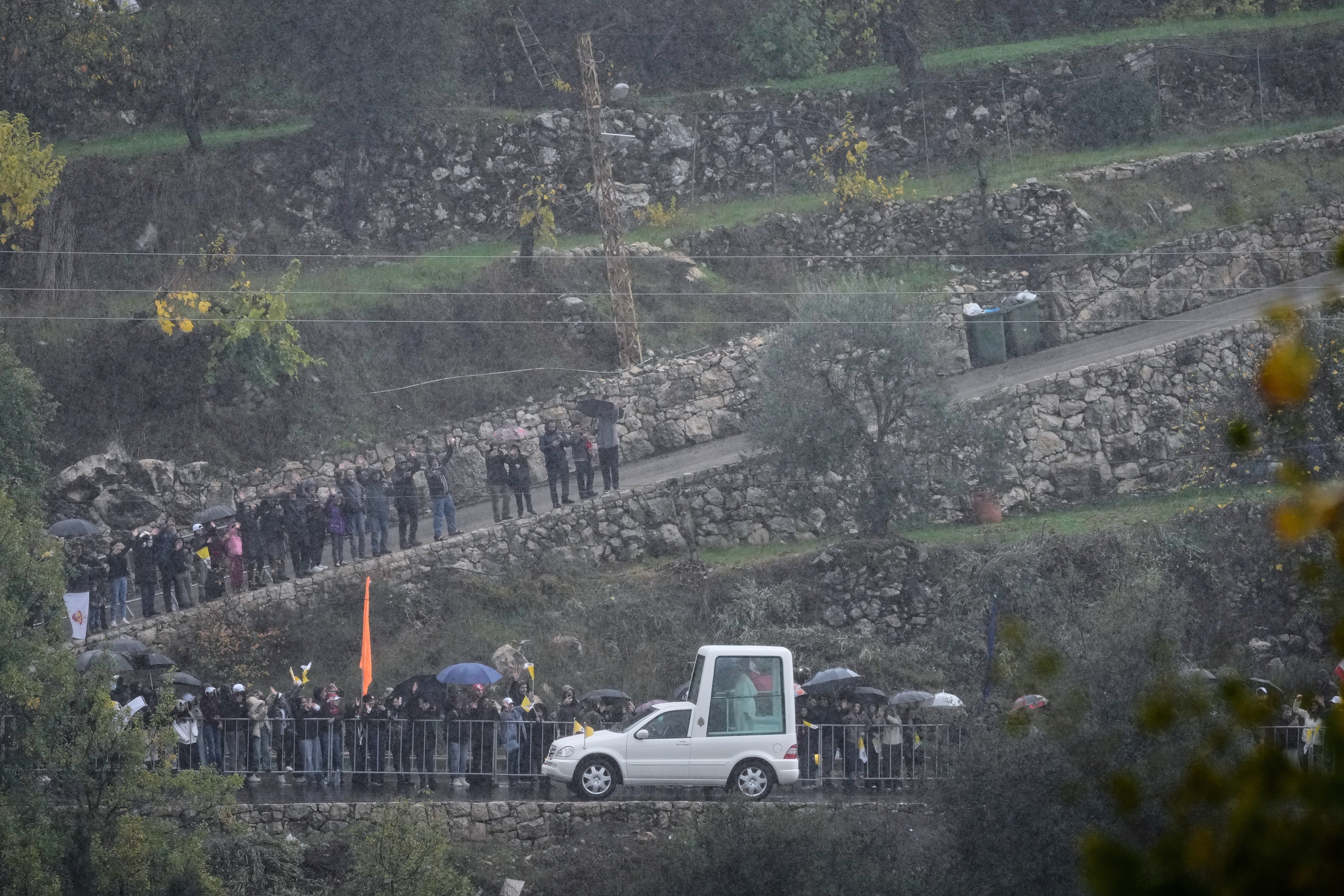 The popemobile carrying Pope Leo XIV arrives at the Monastery of Saint Maroun in Annaya, Lebanon