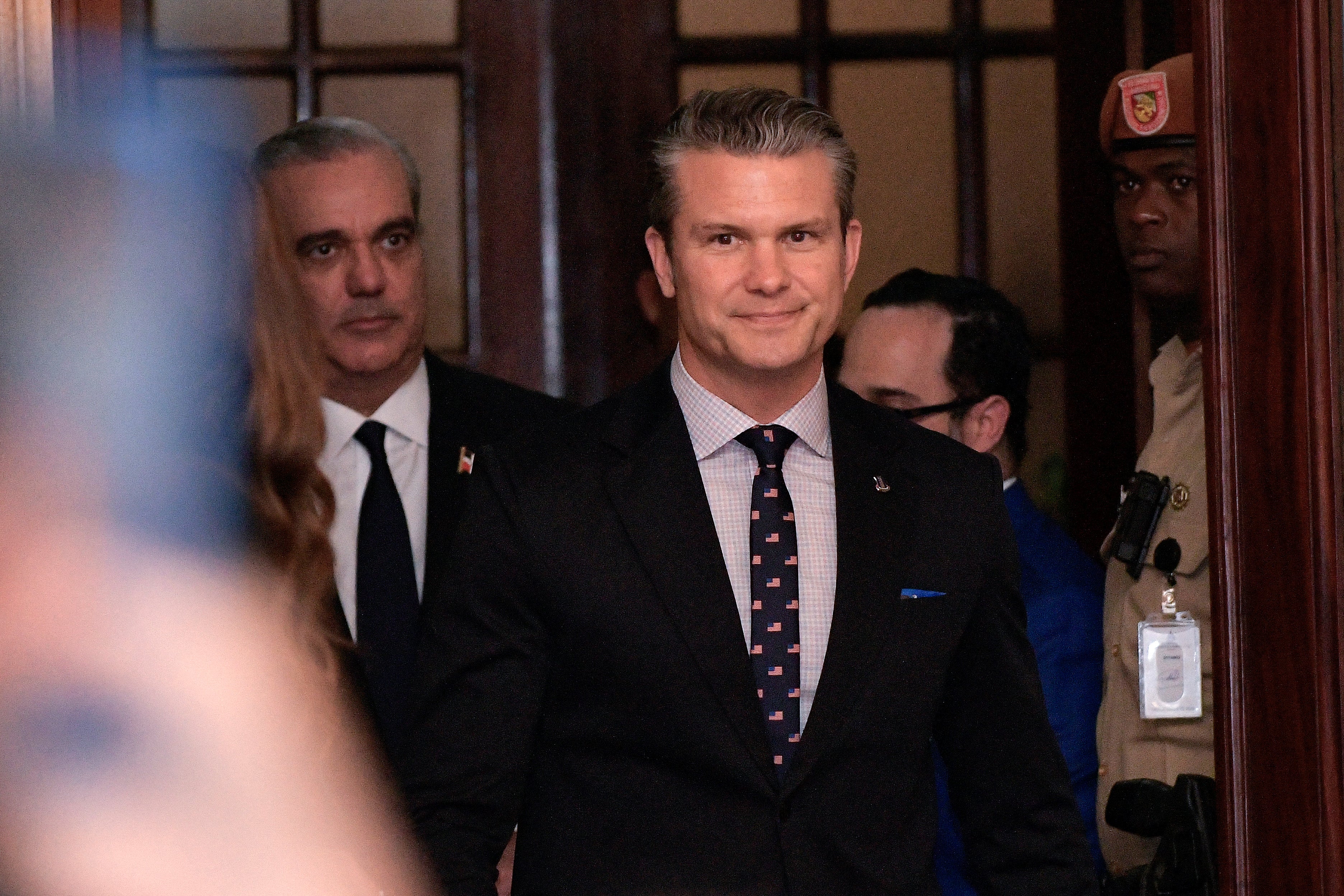 US Secretary of Defense Pete Hegseth walks before a press conference at the Dominican National Palace in Santo Domingo in November
