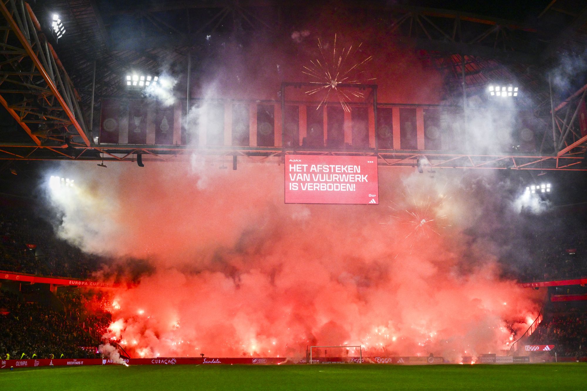 <p>Ajax’s game against Groningen was called off after supporters set off a huge pyro display in the stands</p>