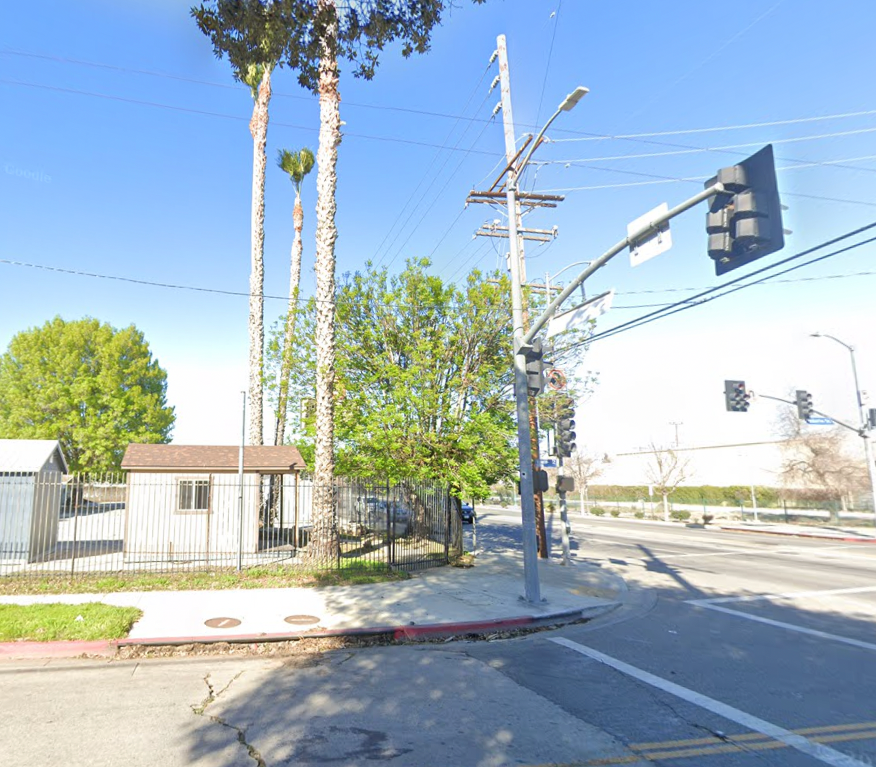 A street view of where a tree trimmer was impaled