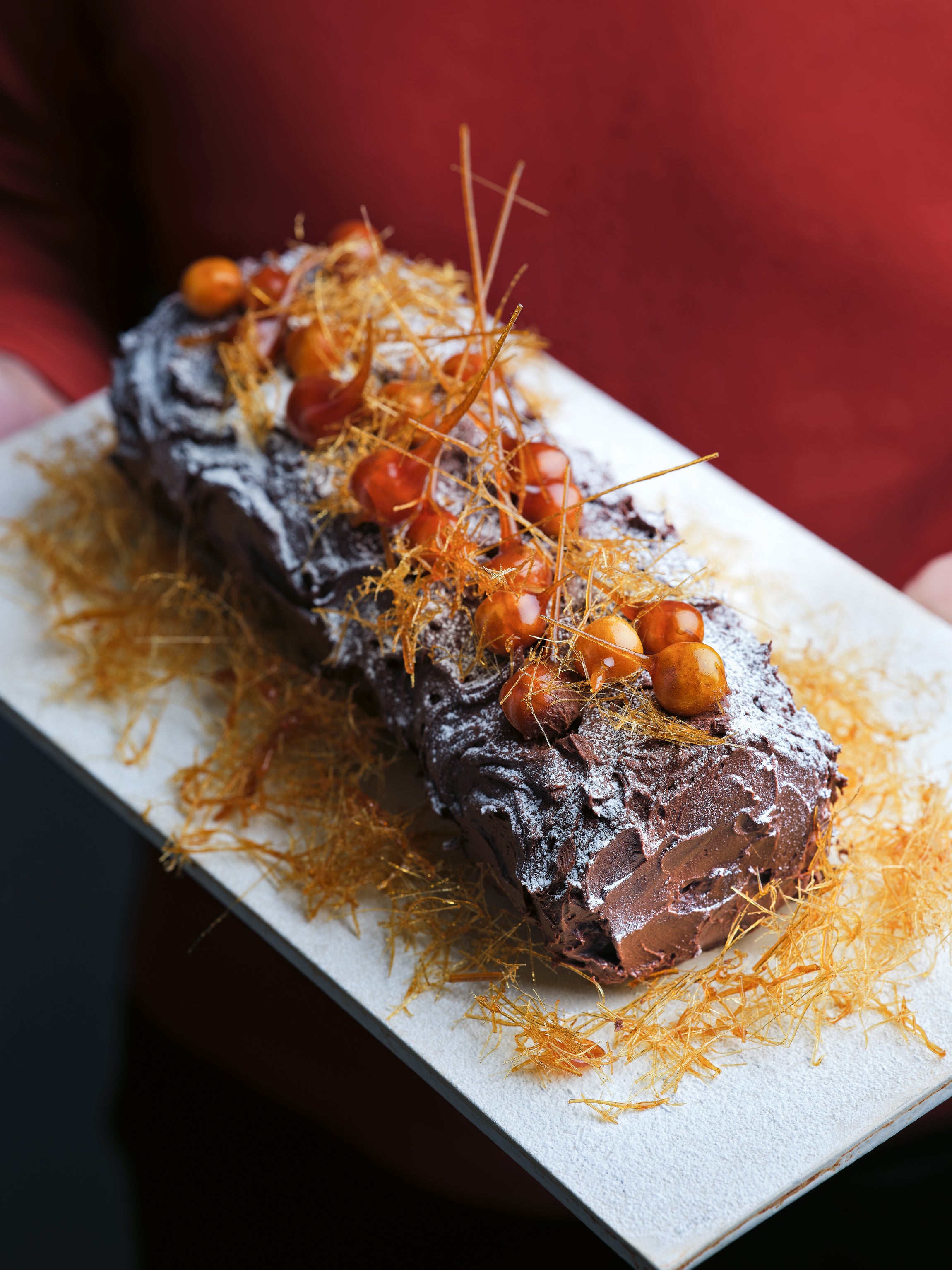 A proper Bûche de Noël that looks impressive but rewards calm hands and good chocolate