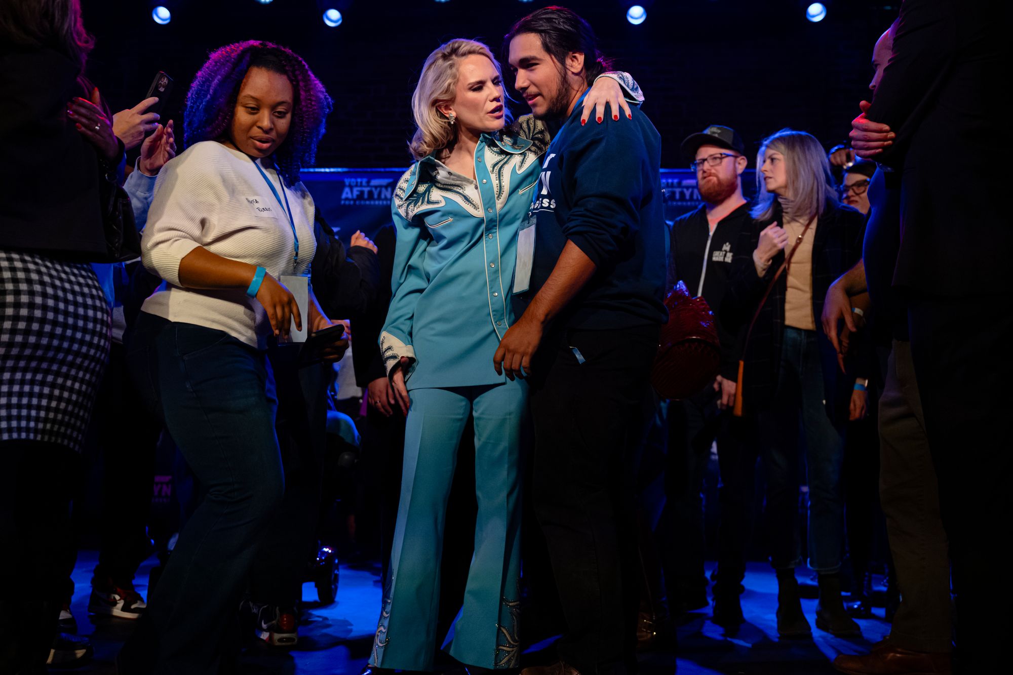 Democrat Aftyn Behn comforts a supporter following her concession speech in Nashville