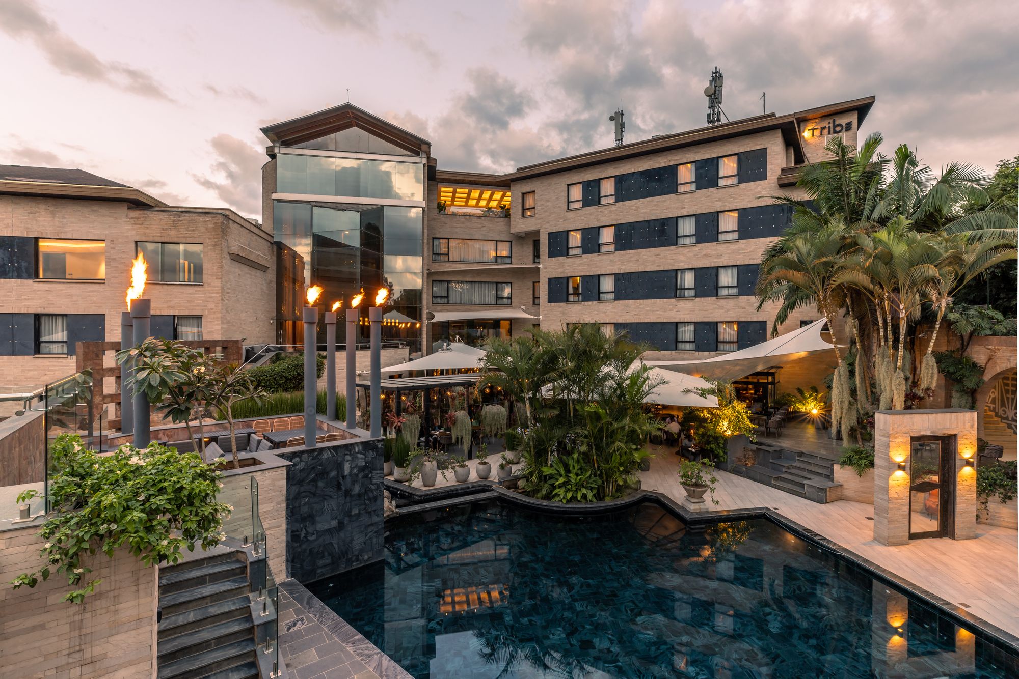 Tribe has an outside swimming pool, as well as a rooftop infinity pool