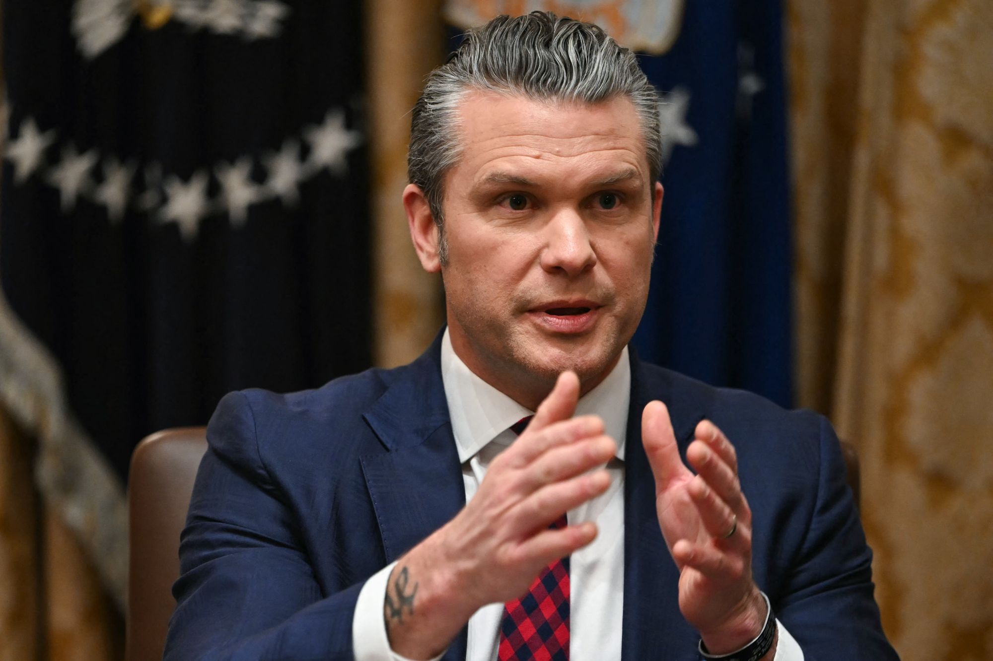 Secretary of Defense Pete Hegseth speaks during a Cabinet Meeting hosted by President Donald Trump in the Cabinet Room of the White House in Washington, DC on December 2, 2025