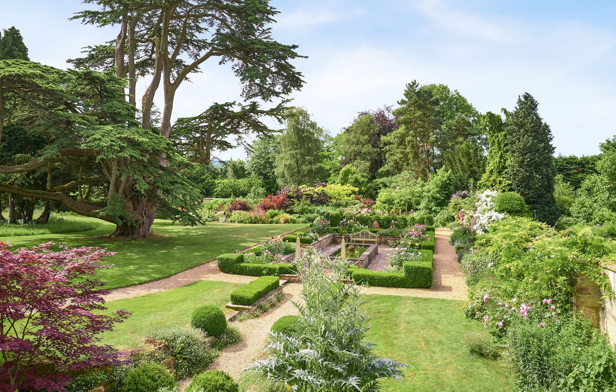 The hotel sits in four acres of lush gardens