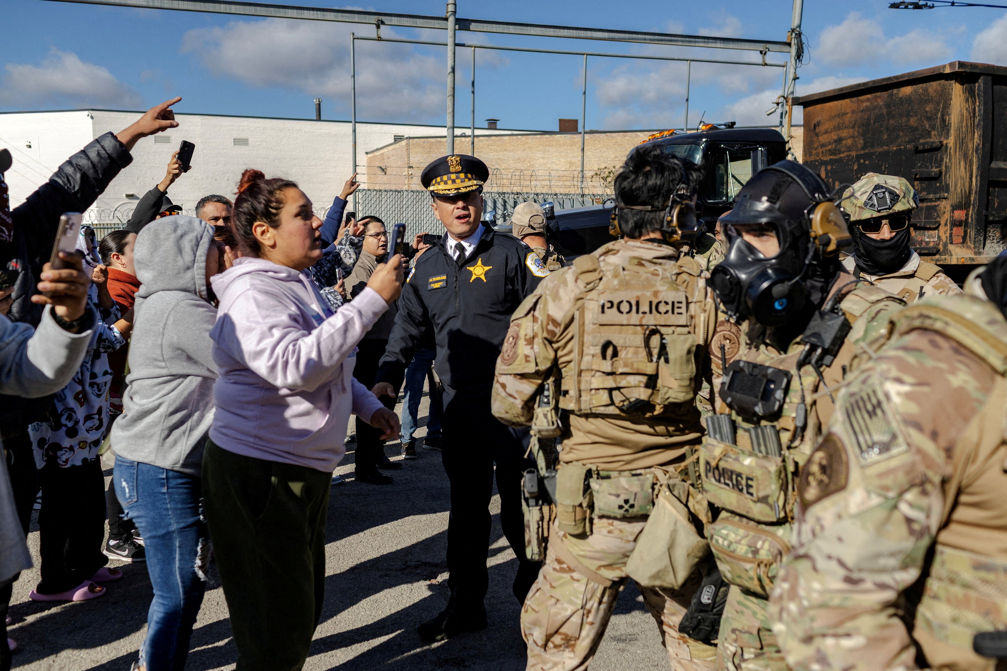 Protesters clash with federal immigration agents in Chicago