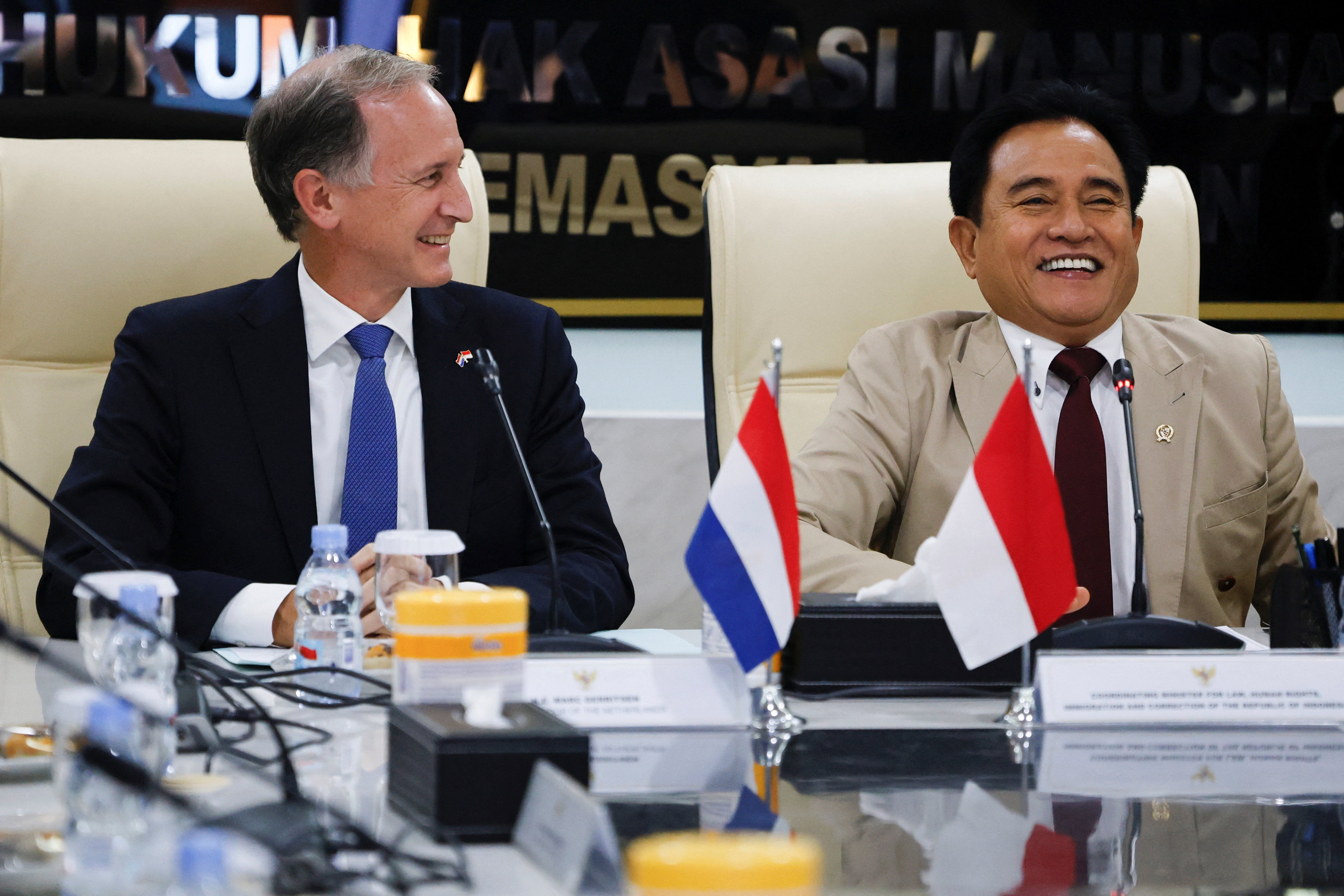 Indonesia's Chief Minister for Law and Human Rights, Yusril Ihza Mahendra, and Dutch Ambassador to Indonesia, Marc Gerritsen, attend a meeting as they agree on the transfer of two Dutch nationals convicted of drug crimes, in Jakarta, Indonesia