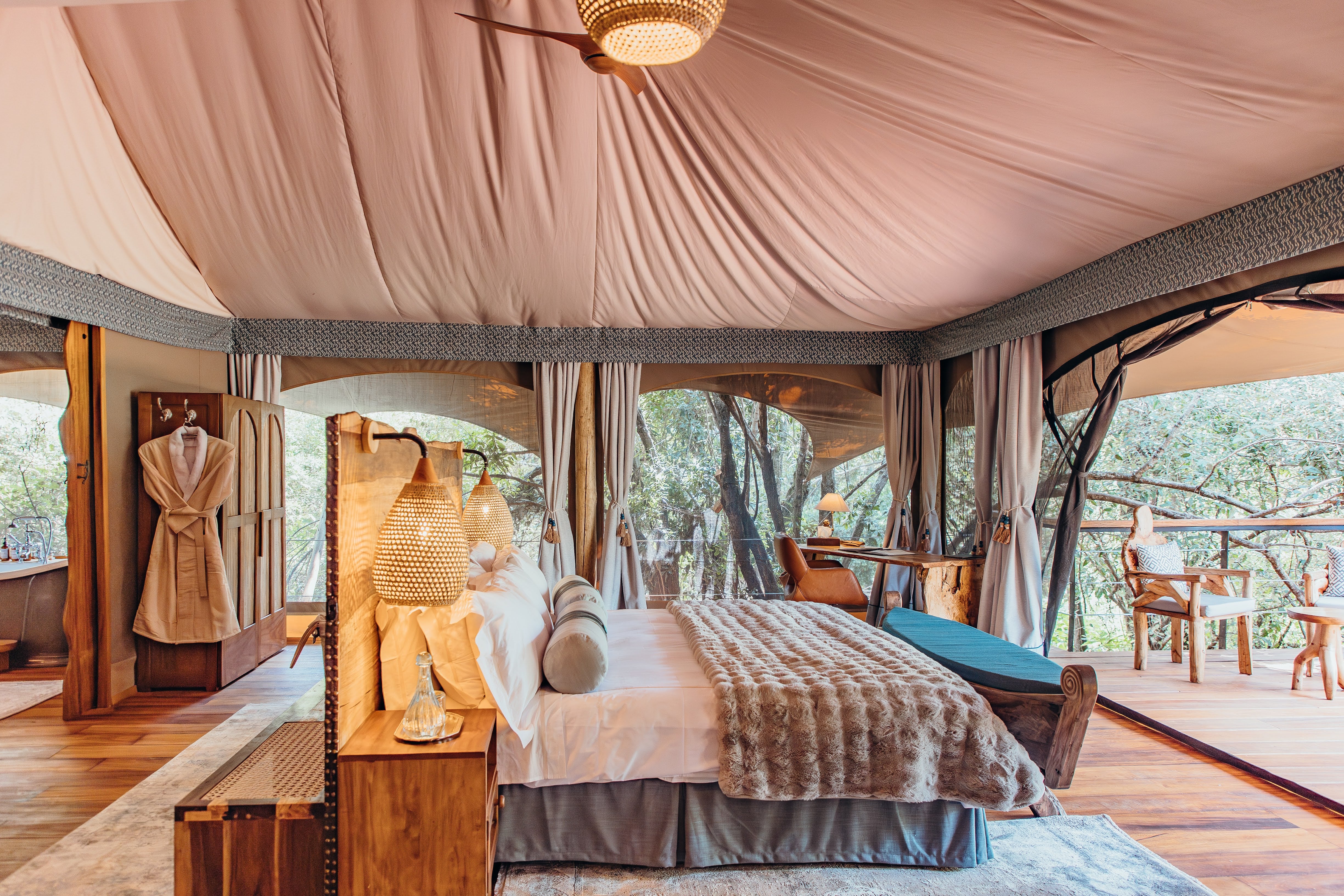 Guests stay in tented suites perched on tree canopy decks
