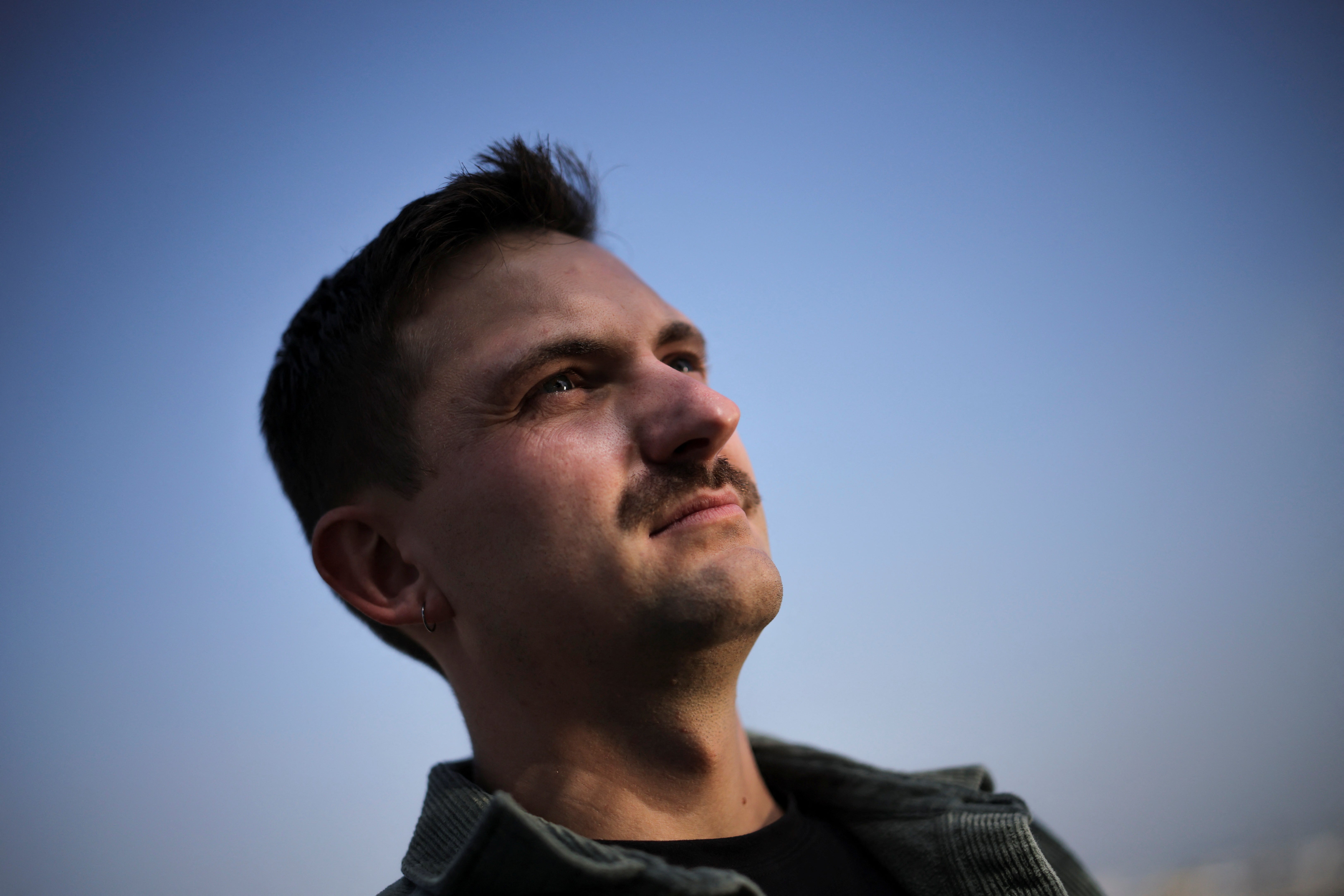 Commercial airline pilot Troy Meritt poses for a portrait outside Los Angeles International Airport