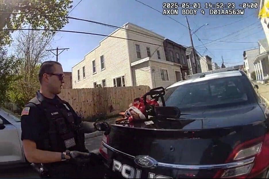 This image taken from body camera footage provided by Cohoes Police Department, N.Y., shows a chainsaw and clown mask, May 1, 2025, in Cohoes, N.Y. (Cohoes Police Department, NY via AP)