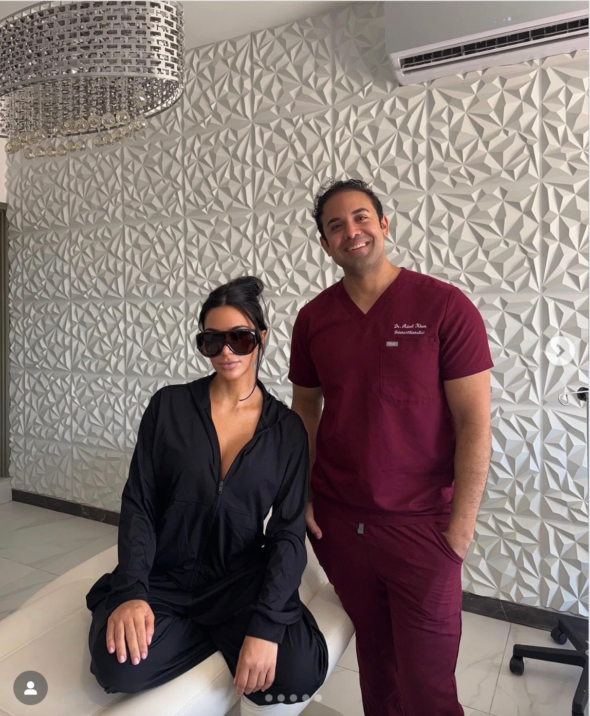 Kim Kardashian poses with Dr. Adeel Khan. Khan treated Kardashian in Mexico with stem cells not yet approved in the U.S.
