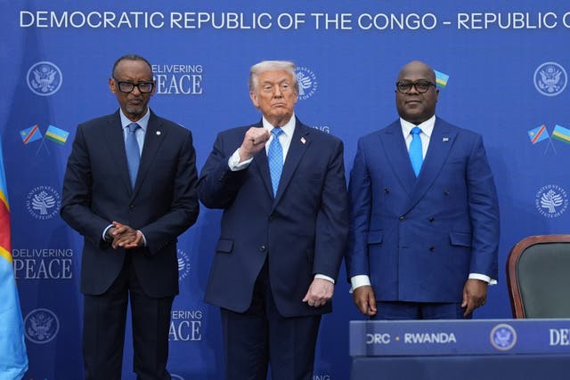 <p>Trump is flanked by Rwanda president Paul Kagame (left) and DR Congo president Felix-Antoine Tshisekedi (right)</p>