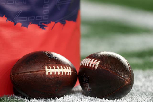 <p>A general view of the NFL game ball on the field prior to the game between the New York Giants and the New England Patriots at Gillette Stadium on December 01, 2025 in Foxborough, Massachusetts</p>