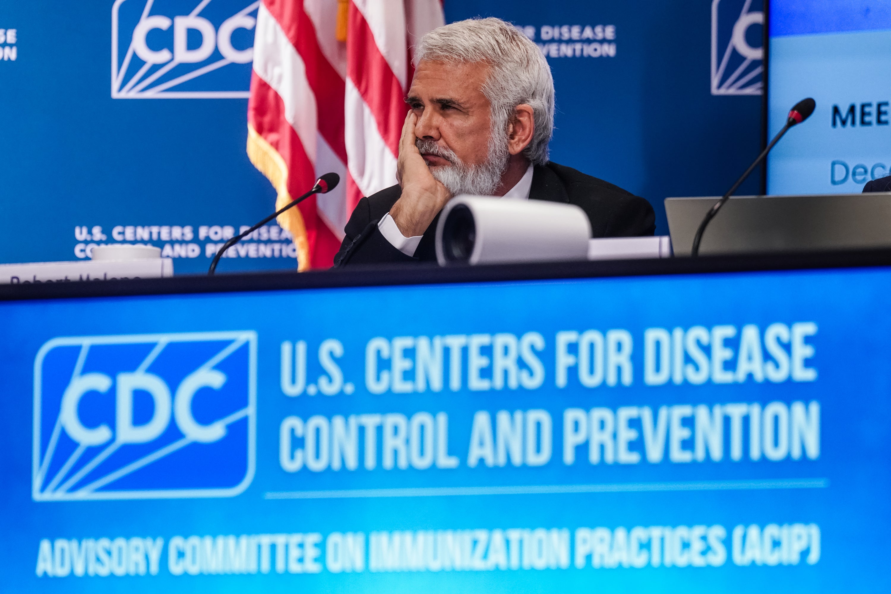 Dr. Robert Malone listens during a meeting of the CDC Advisory Committee on Immunization Practices ahead of a possible vote on changes to the childhood vaccination schedule and delay hepatitis B shots